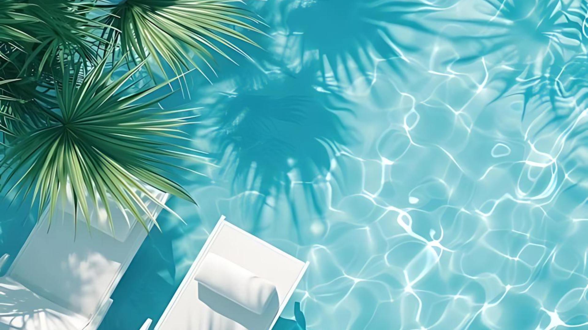 A swimming pool with palm trees and chairs in it.