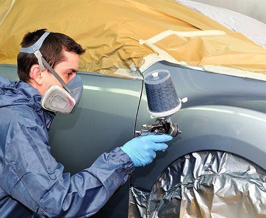 Worker Painting Car — Rowlett, TX — JNM Painting Autobody Shop Worker Painting Car — Rowlett, TX — JNM Painting Autobody Shop