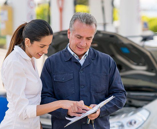 Woman Talking To Man — Rowlett, TX — JNM Painting Autobody Shop Woman Talking To Man — Rowlett, TX — JNM Painting Autobody Shop