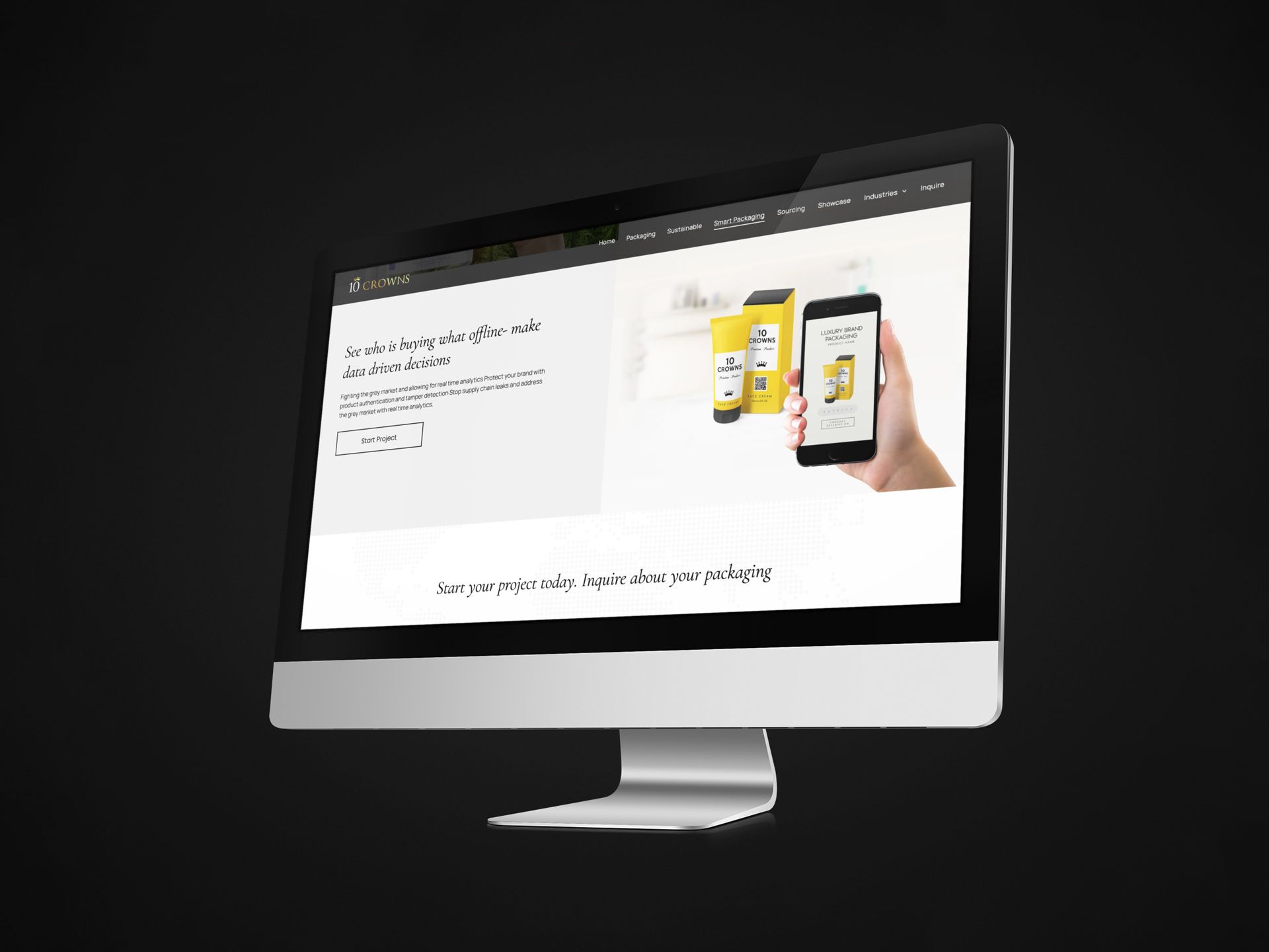 An apple computer with the 10 Crowns website on the screen