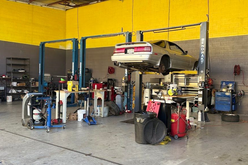 Car on a lift, tools, equipment | Sky Auto Express