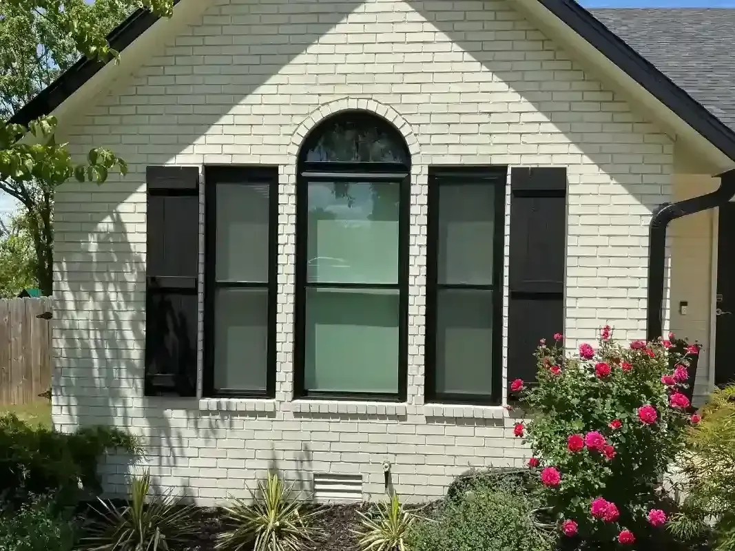 Interior view of newly installed windows allowing natural light and improving home aesthetics.