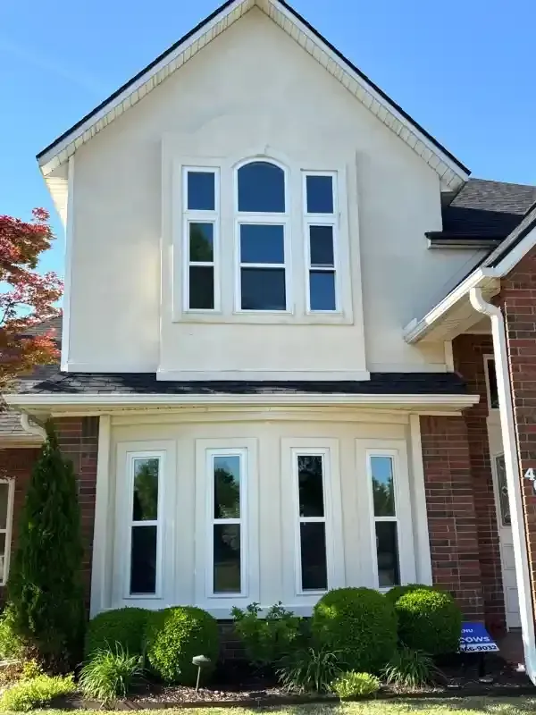 Stylish residential window replacement enhancing curb appeal and energy efficiency.