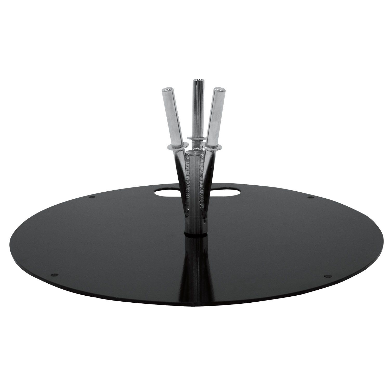 A black plate with three sticks sticking out of it on a white background.