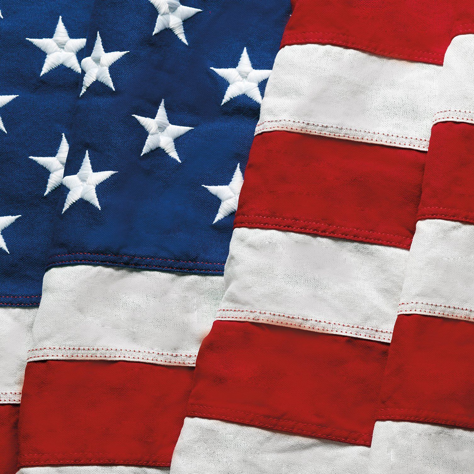 A red white and blue american flag with white stars