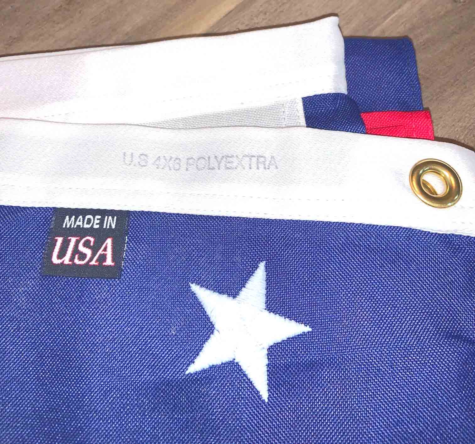 A made in usa flag with a white star on it