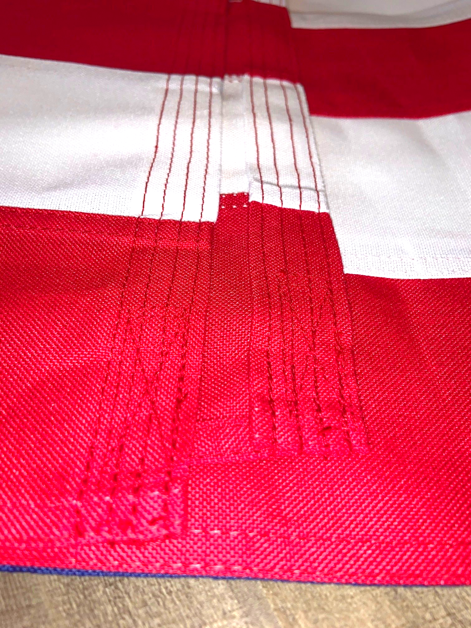 A close up of a red and white striped fabric
