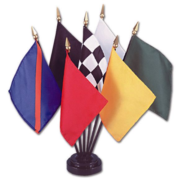 A bunch of different colored flags on a stand