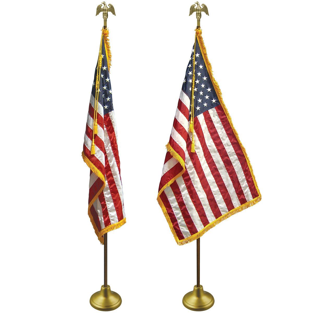 Two american flags on brass poles on a white background