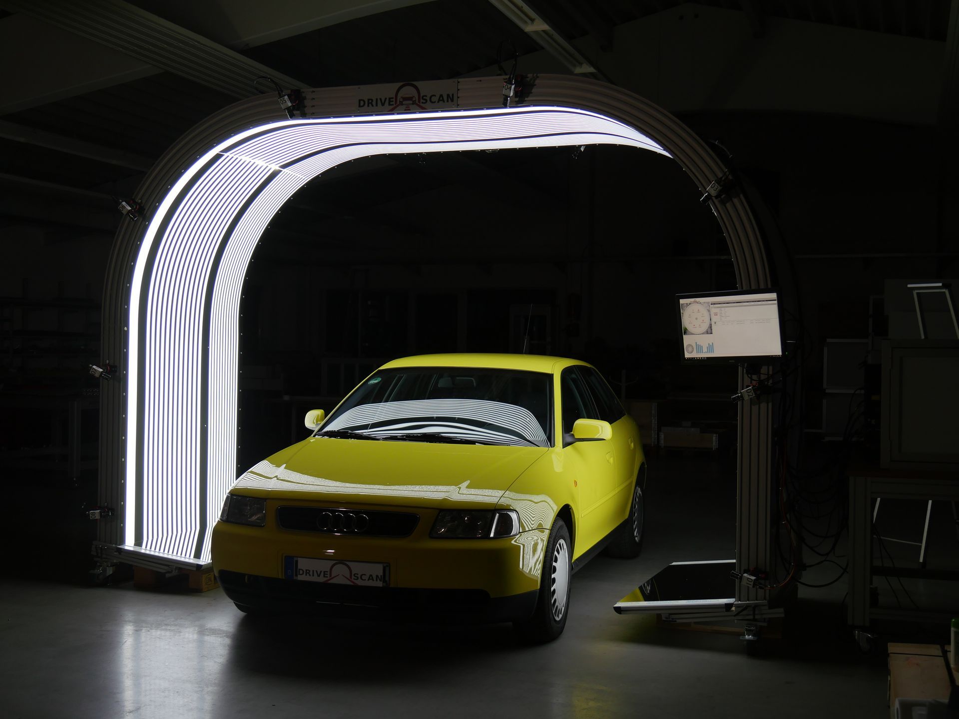 DRIVEnSCAN pass through side shot yellow car