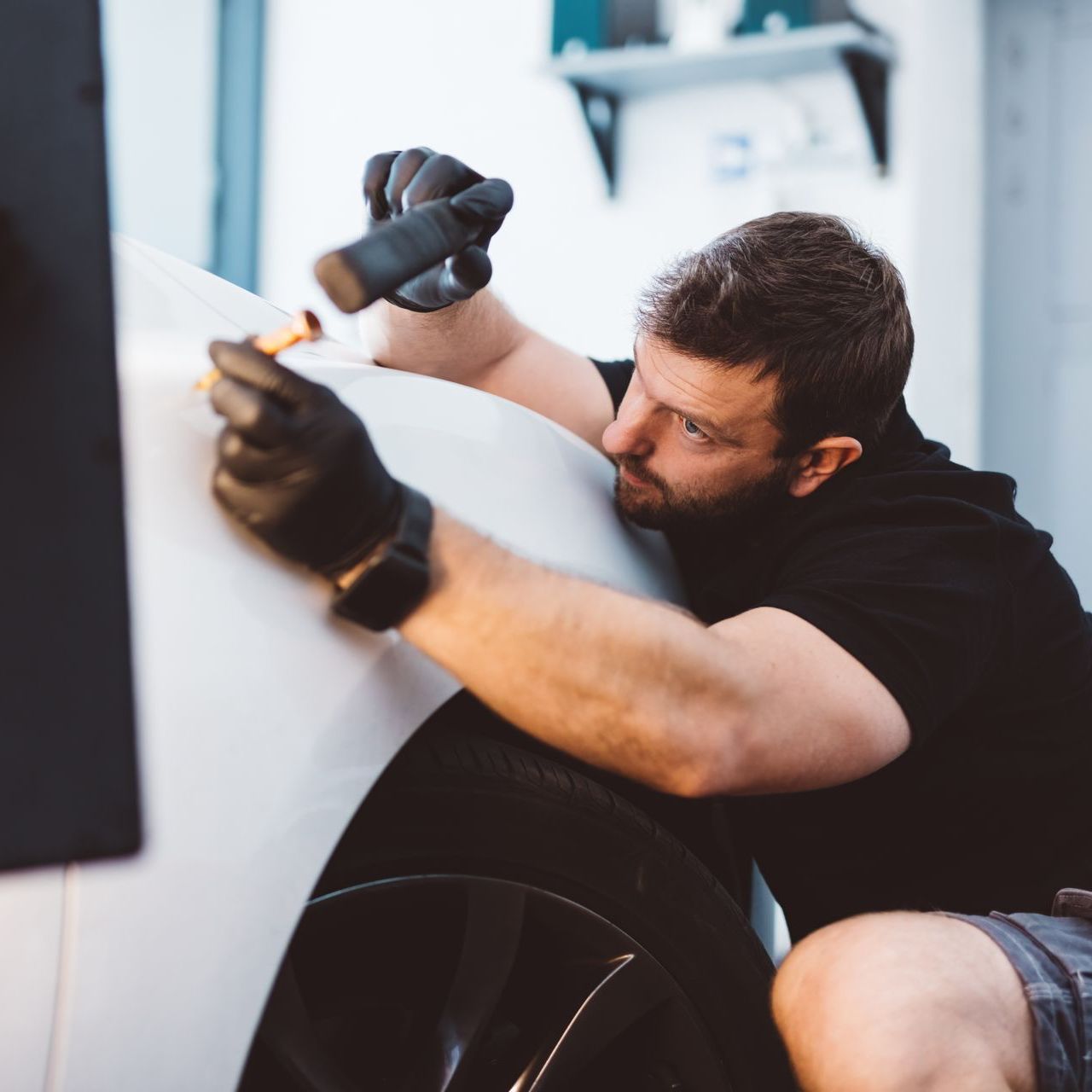 fixing hail damage with tools
