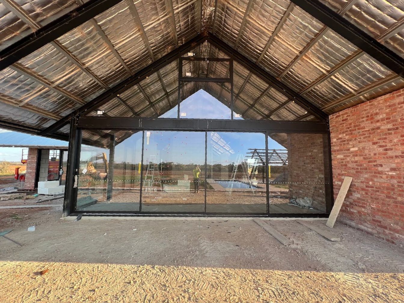 A Large Room With A Lot Of Windows — SG Glass & Aluminium in Wagga Wagga, NSW