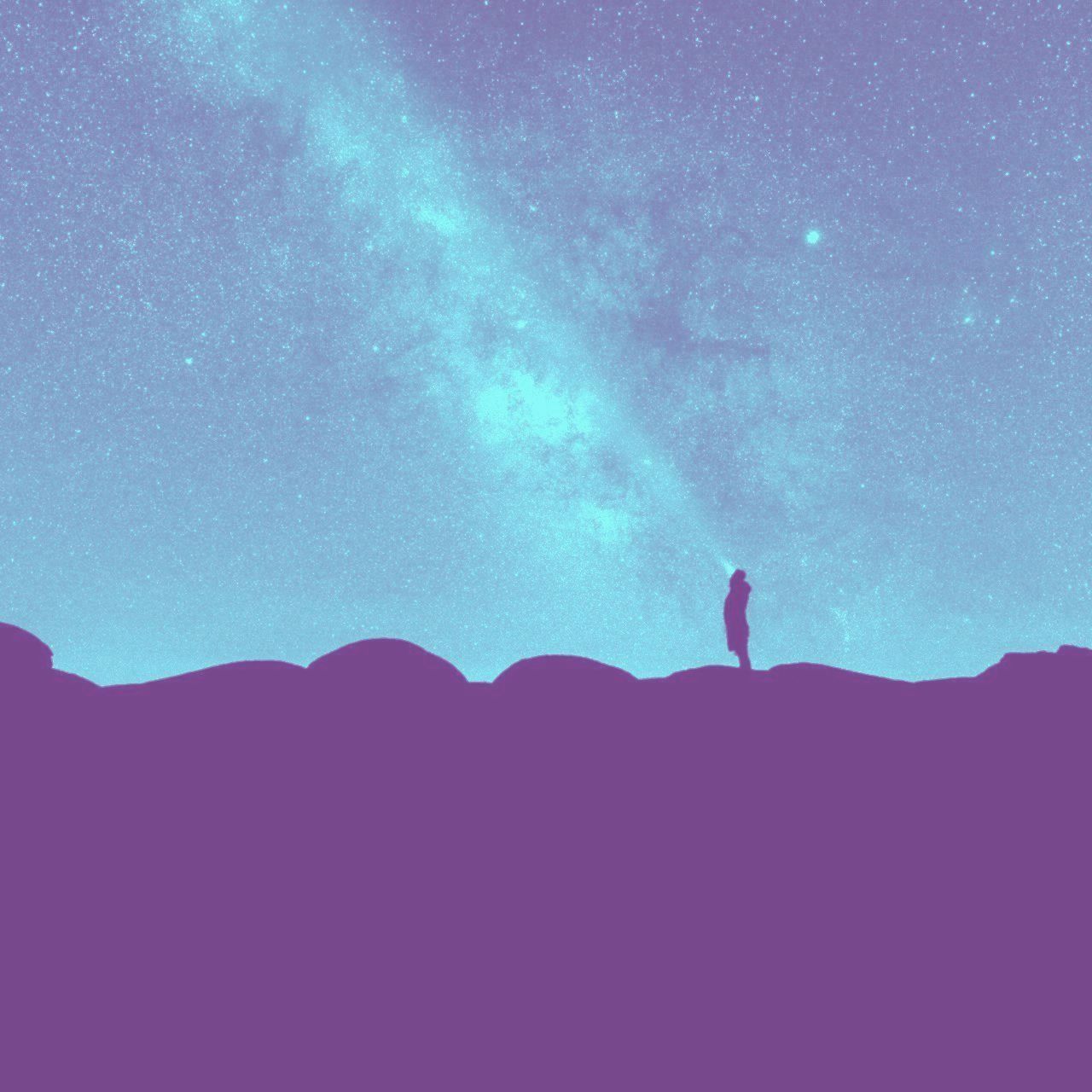 person gazing at stars