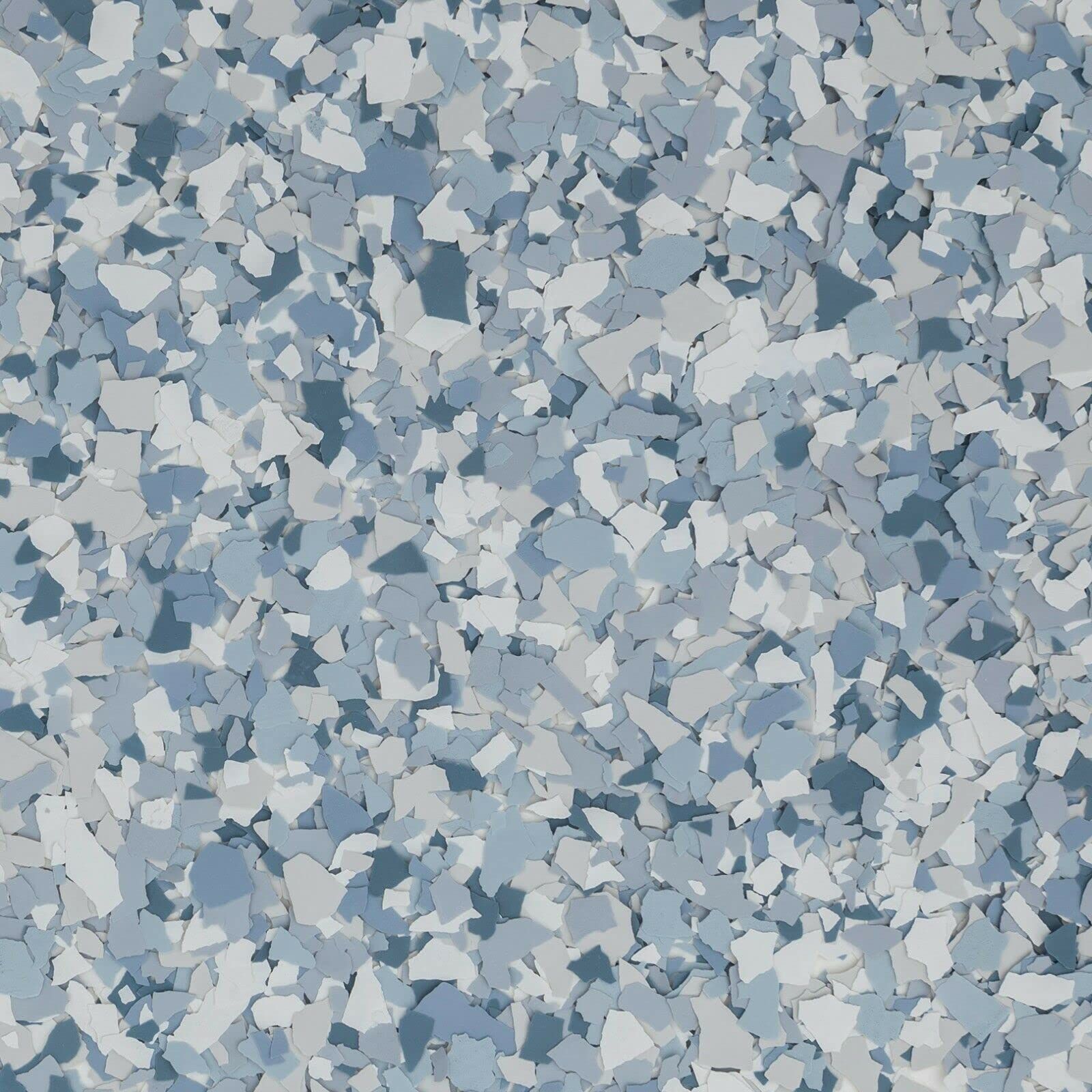 Abstract pattern of small blue, gray, and white mosaic-like tiles