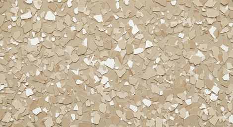 Beige textured surface with scattered off-white flecks, like terrazzo or speckled flooring.