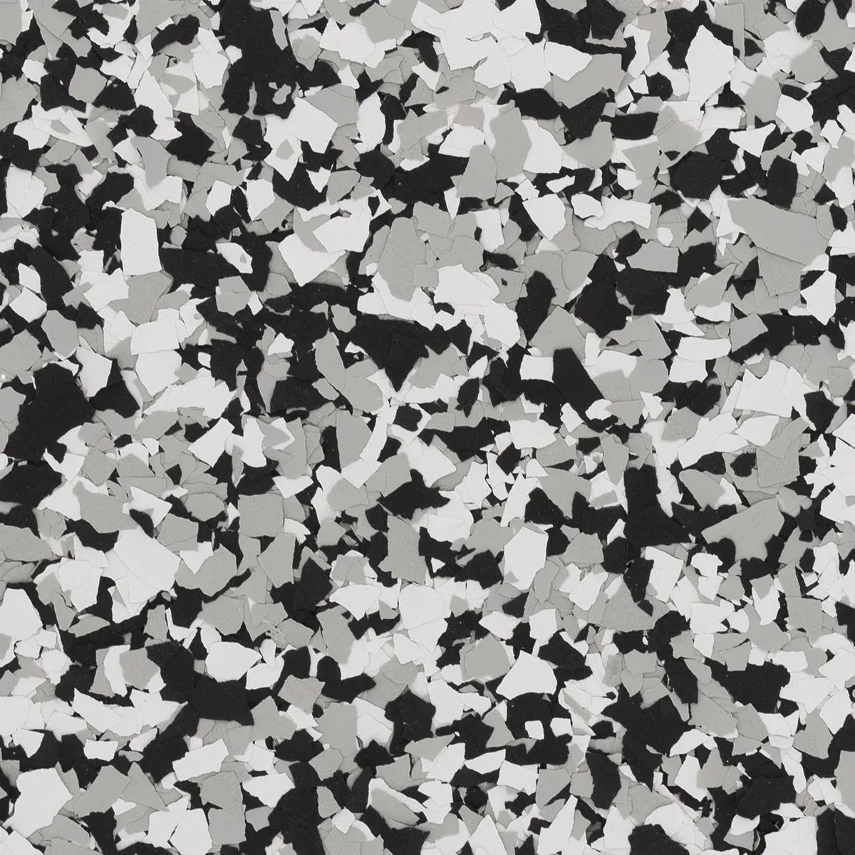 Black, gray, and white speckled abstract pattern resembling terrazzo or camouflage background