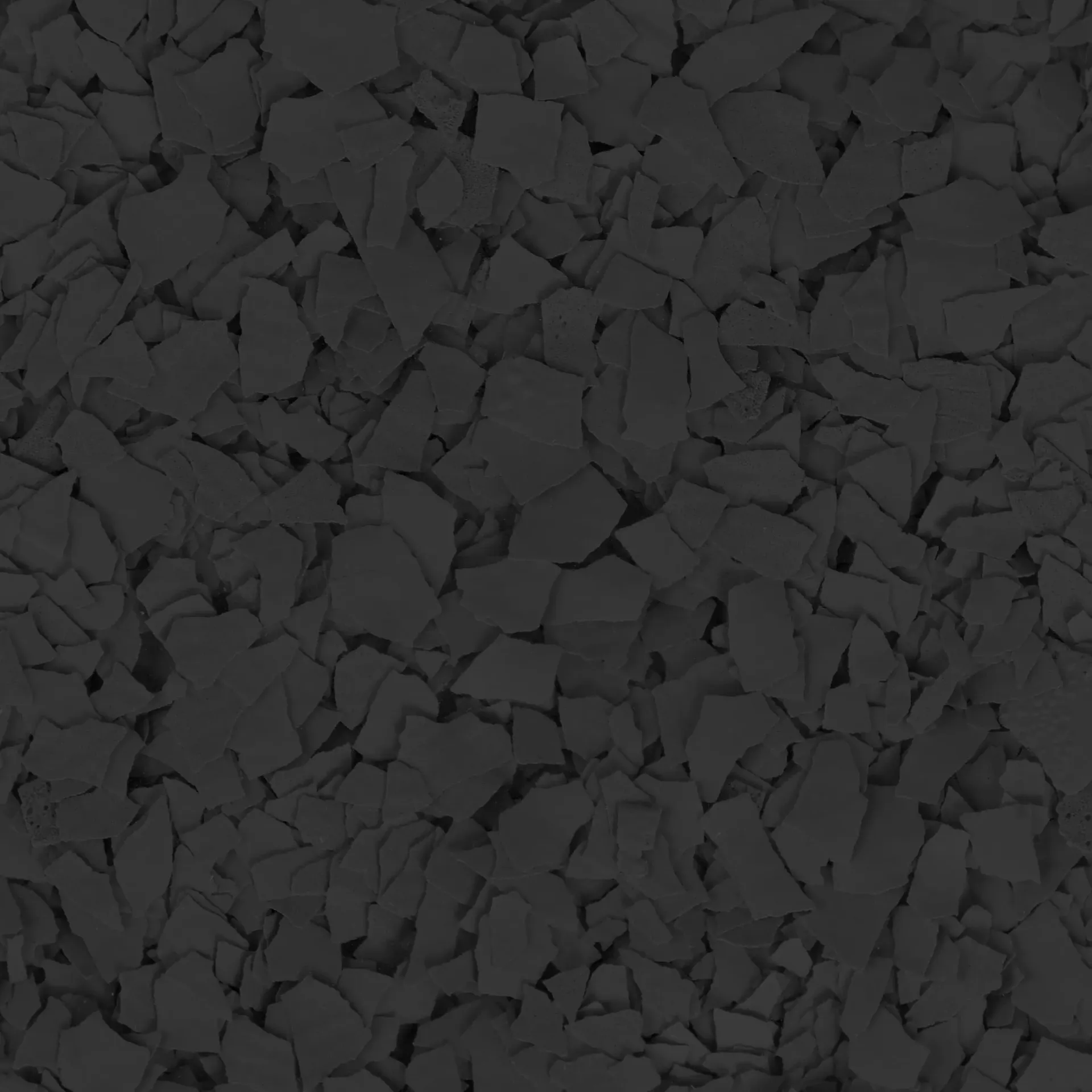 Dark gray gravel or crushed stone filling the frame.