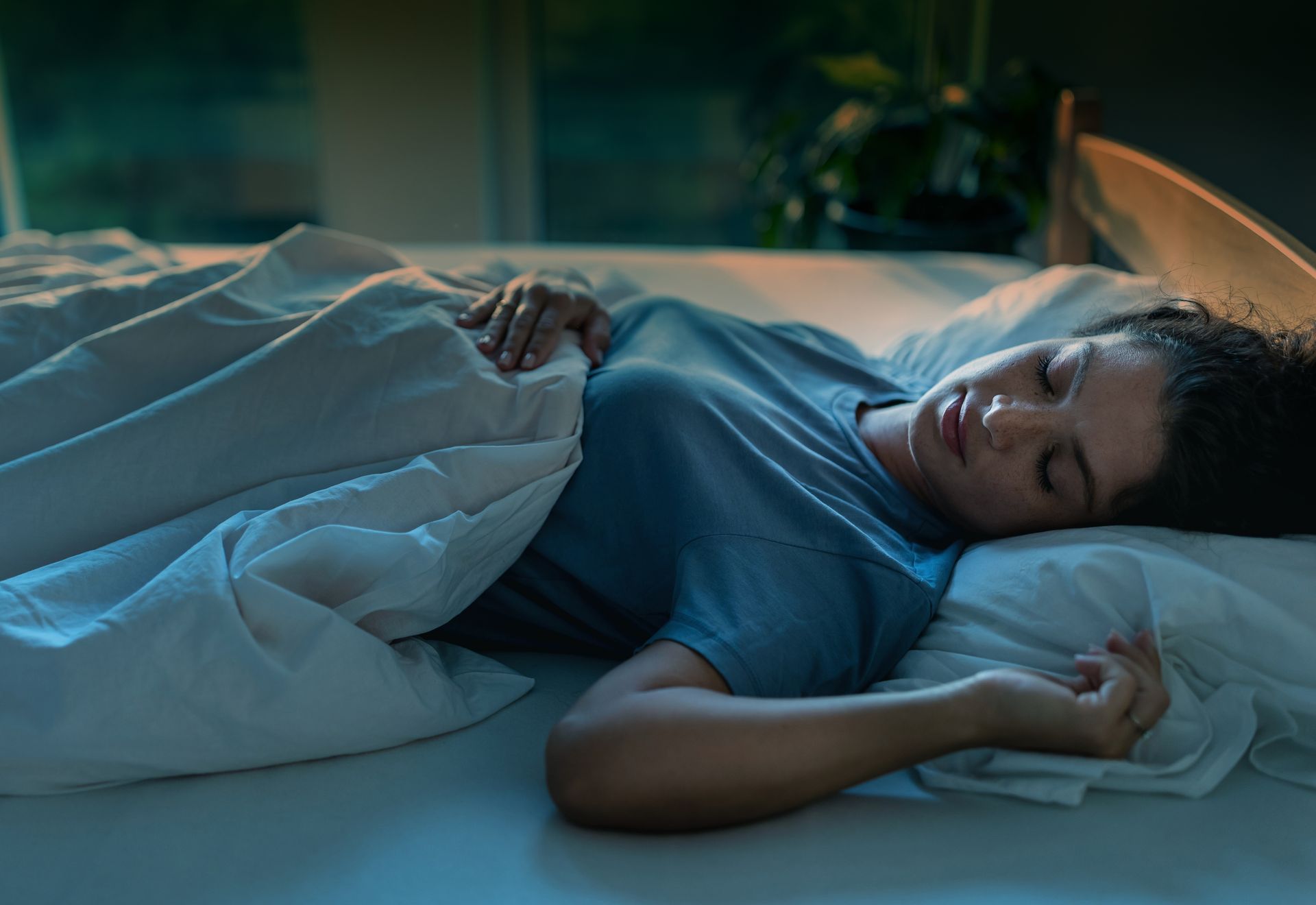 woman sleeping on back