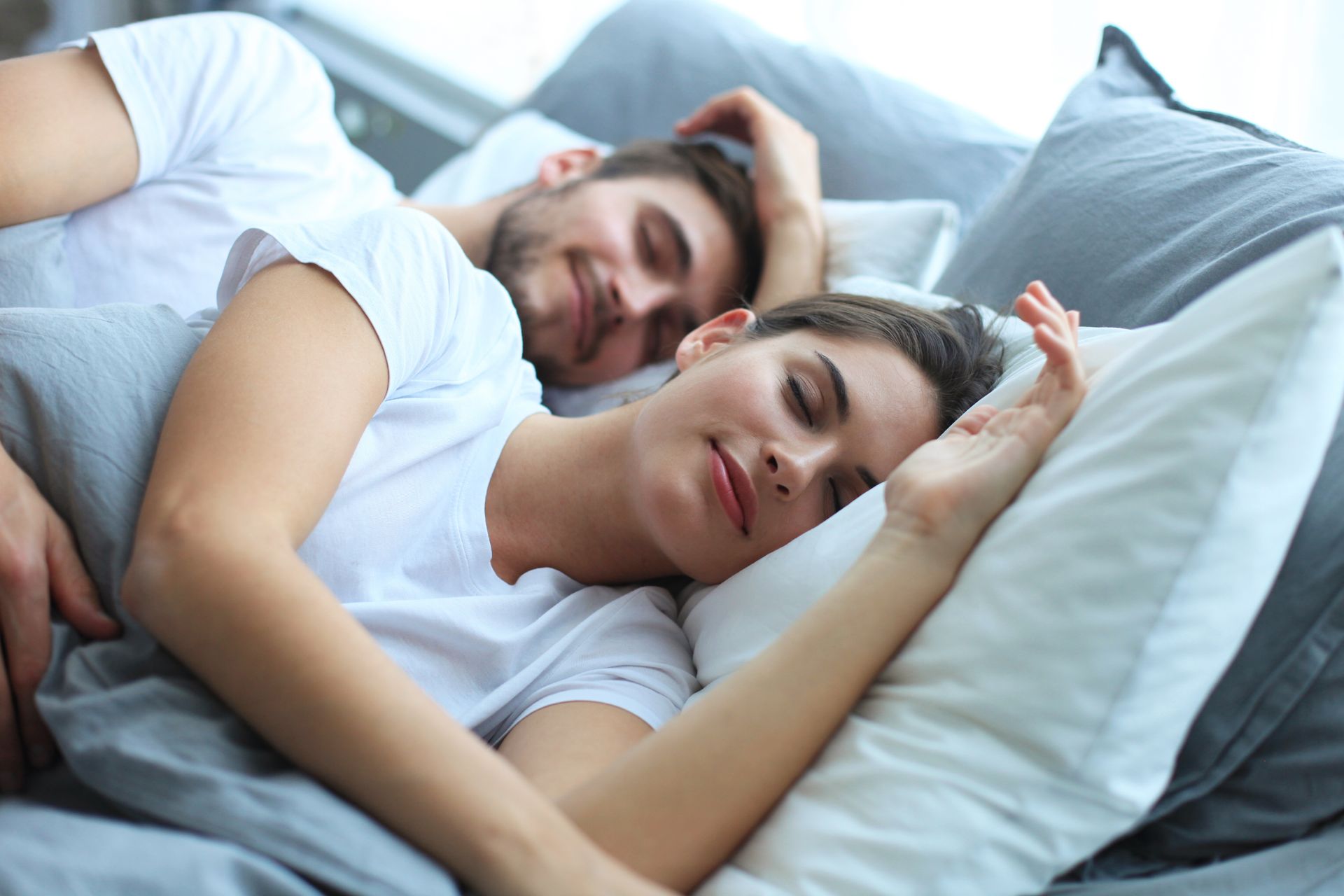 couple sleeping in bed