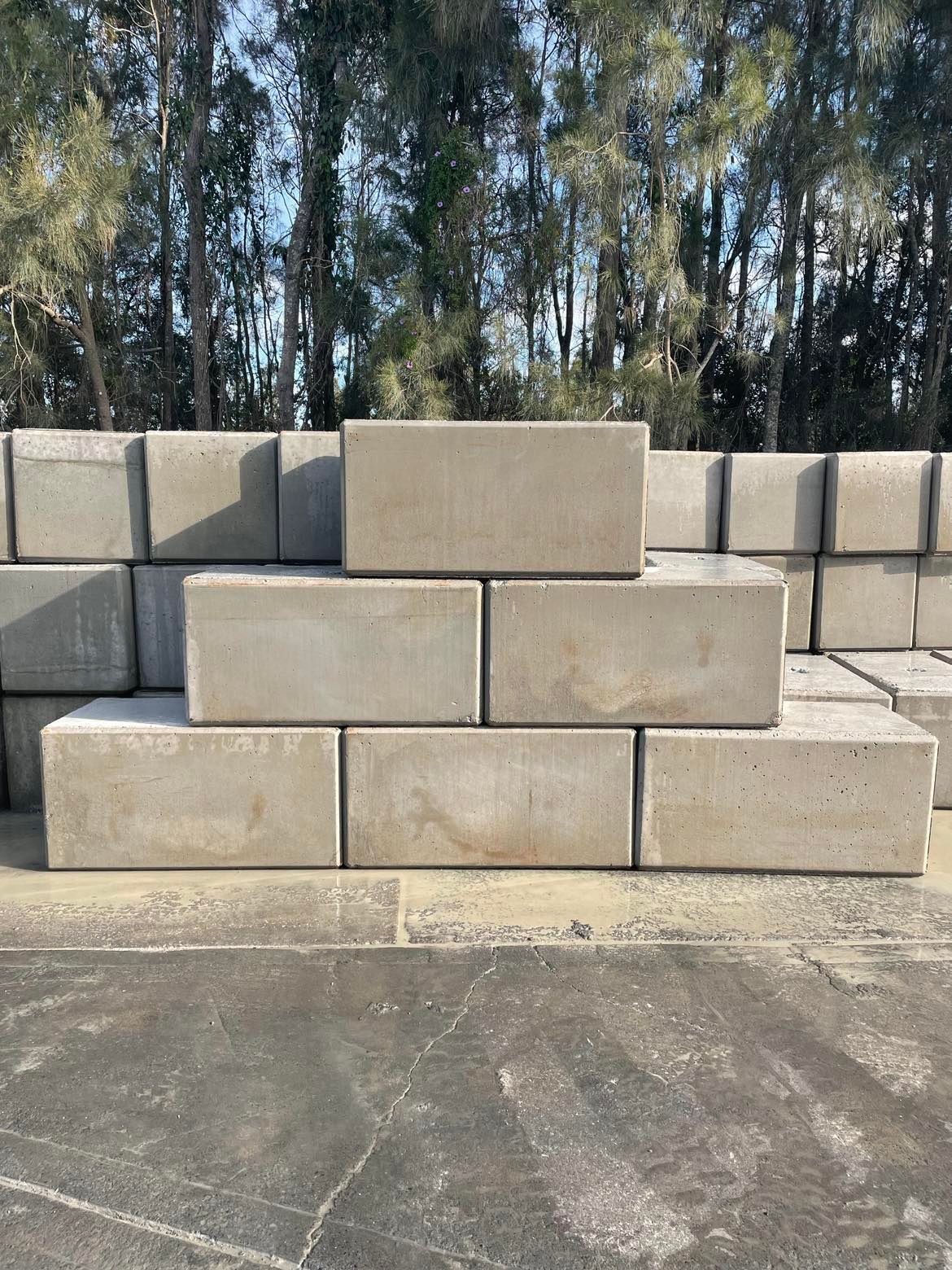 Slabs stacked ontop of each other in a pyramid — Providing Steel & Concrete Construction In Eviron, NSW