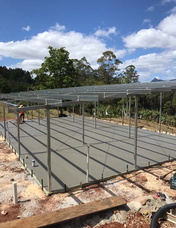 Construction Site With A Lot Of Concrete Being Poured — Providing Steel & Concrete Construction In Byron Bay, NSW