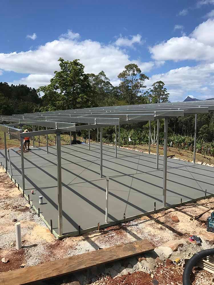 Large Concrete Structure Is Being Built In The Middle Of A Field — Providing Steel & Concrete Construction In Eviron, NSW