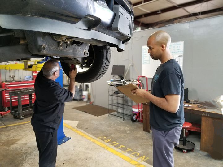 Our Technicians Works on Vehicle in Lilburn, GA - Wrench Junkies