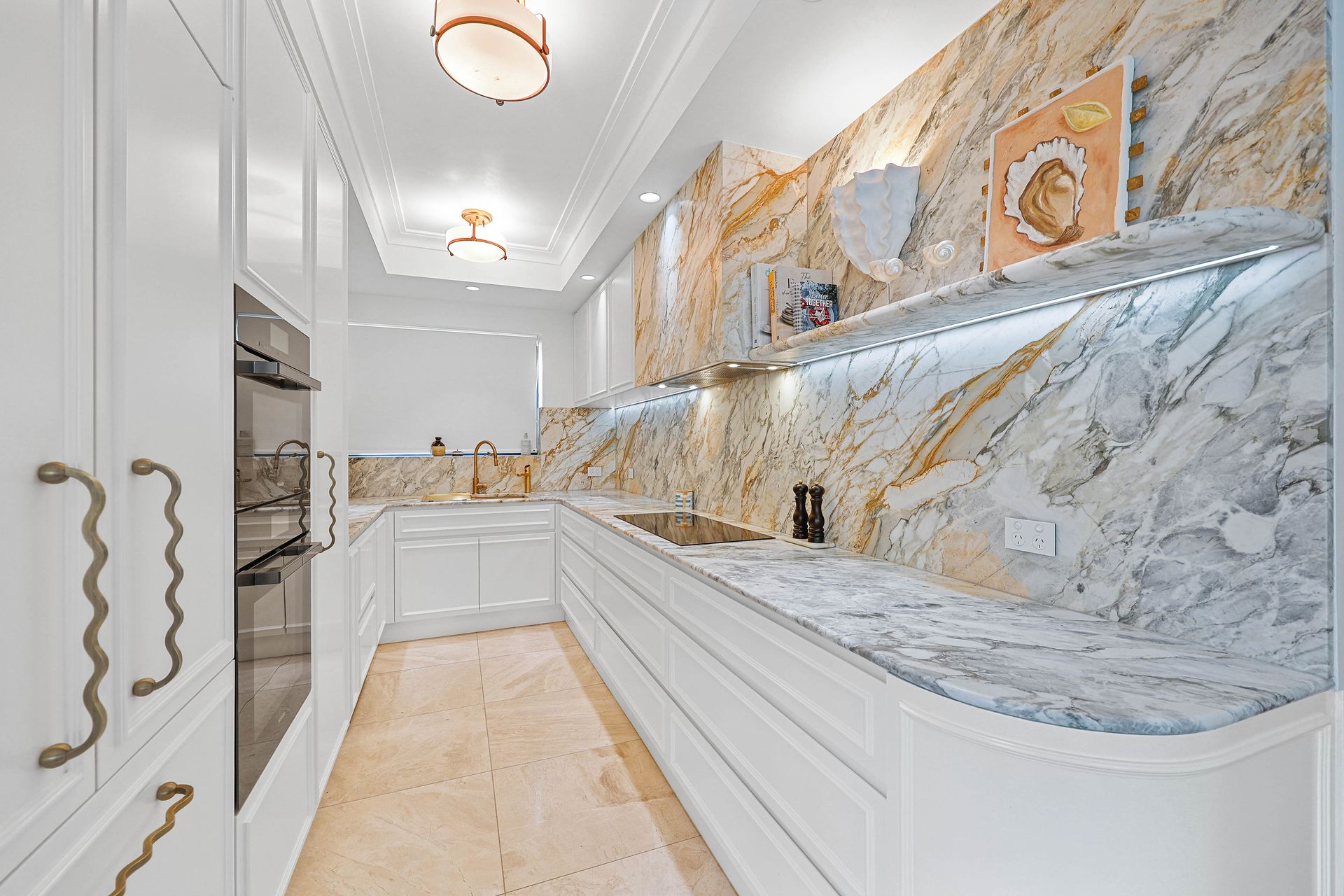 Modern kitchen with feature marbled benchtops — Above & Beyond Interiors in Southern Highlands, NSW
