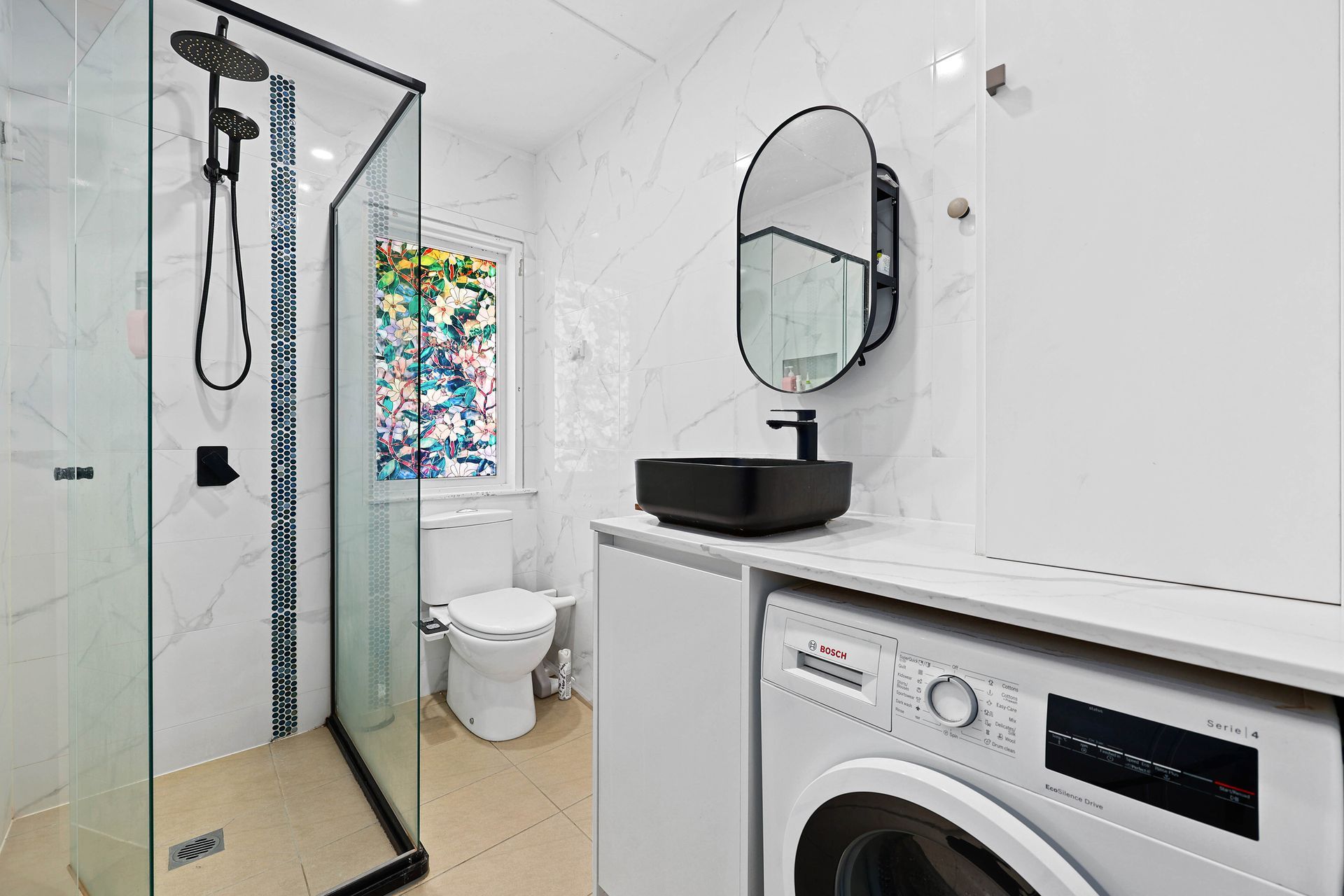 Modern White Bathroom with Glass Shower — Above & Beyond Interiors in Smeaton Grange, NSW