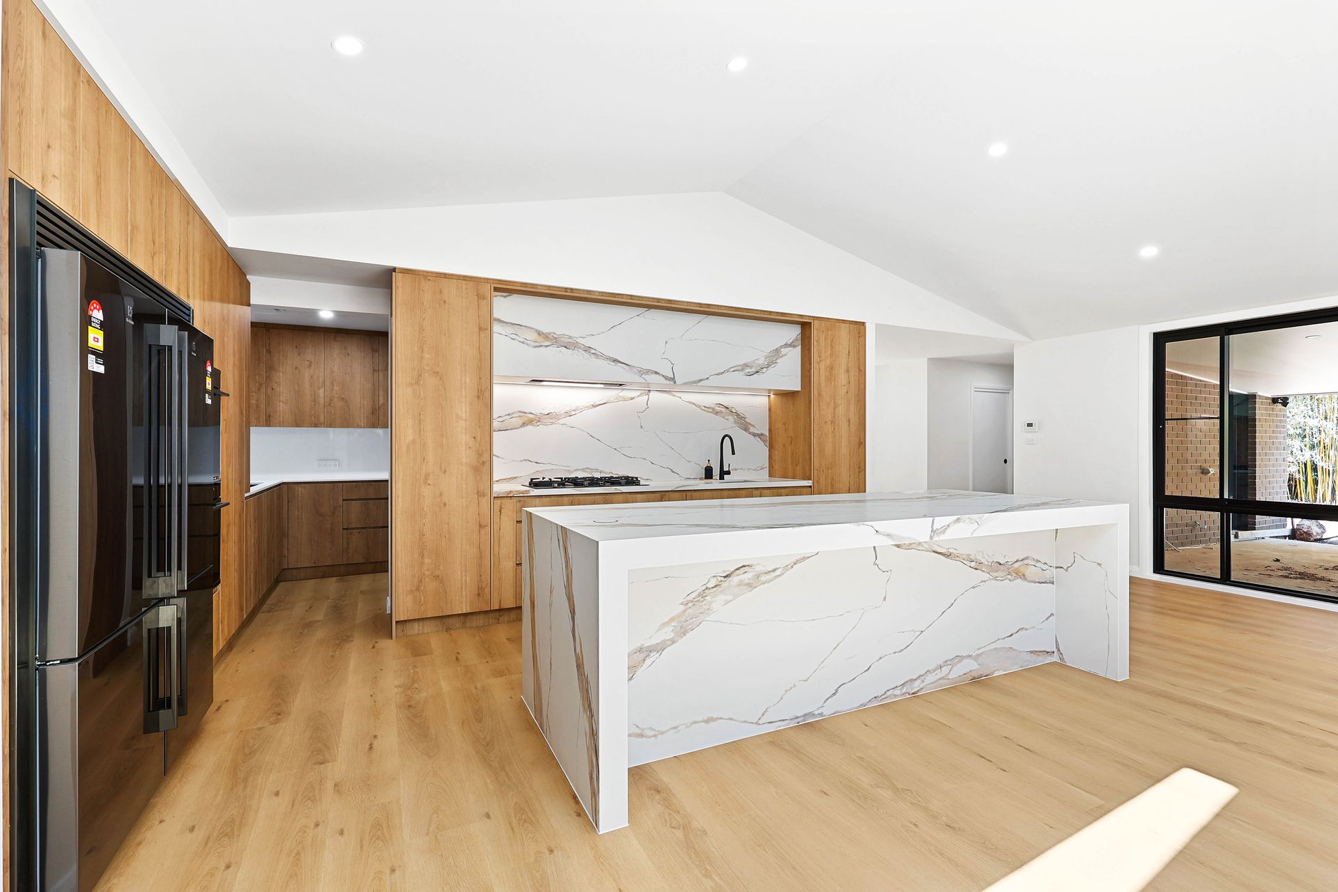 Modern Kitchen with White Marble Island — Above & Beyond Interiors in Smeaton Grange, NSW