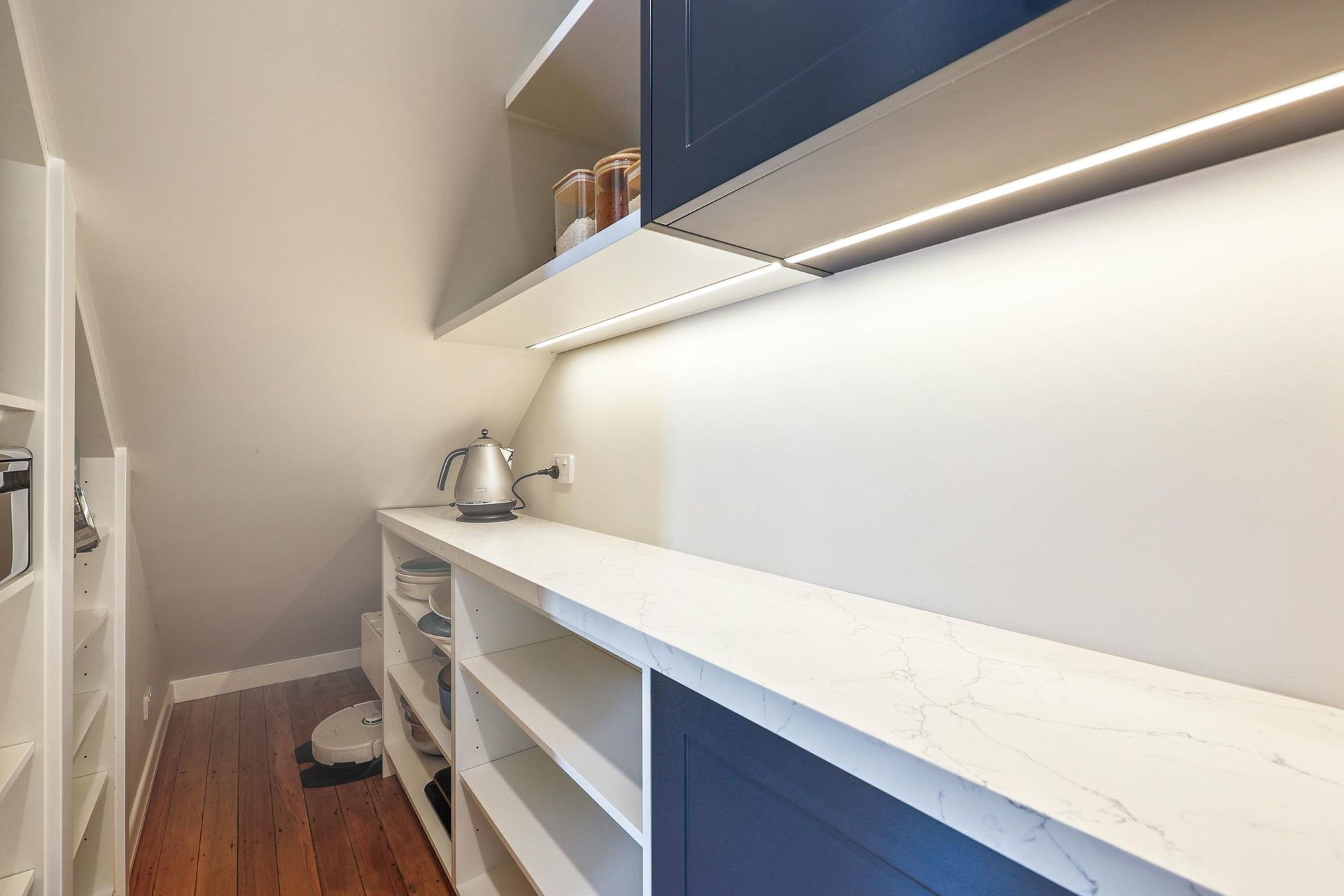 Narrow Pantry With White Countertops — Above & Beyond Interiors in Smeaton Grange, NSW