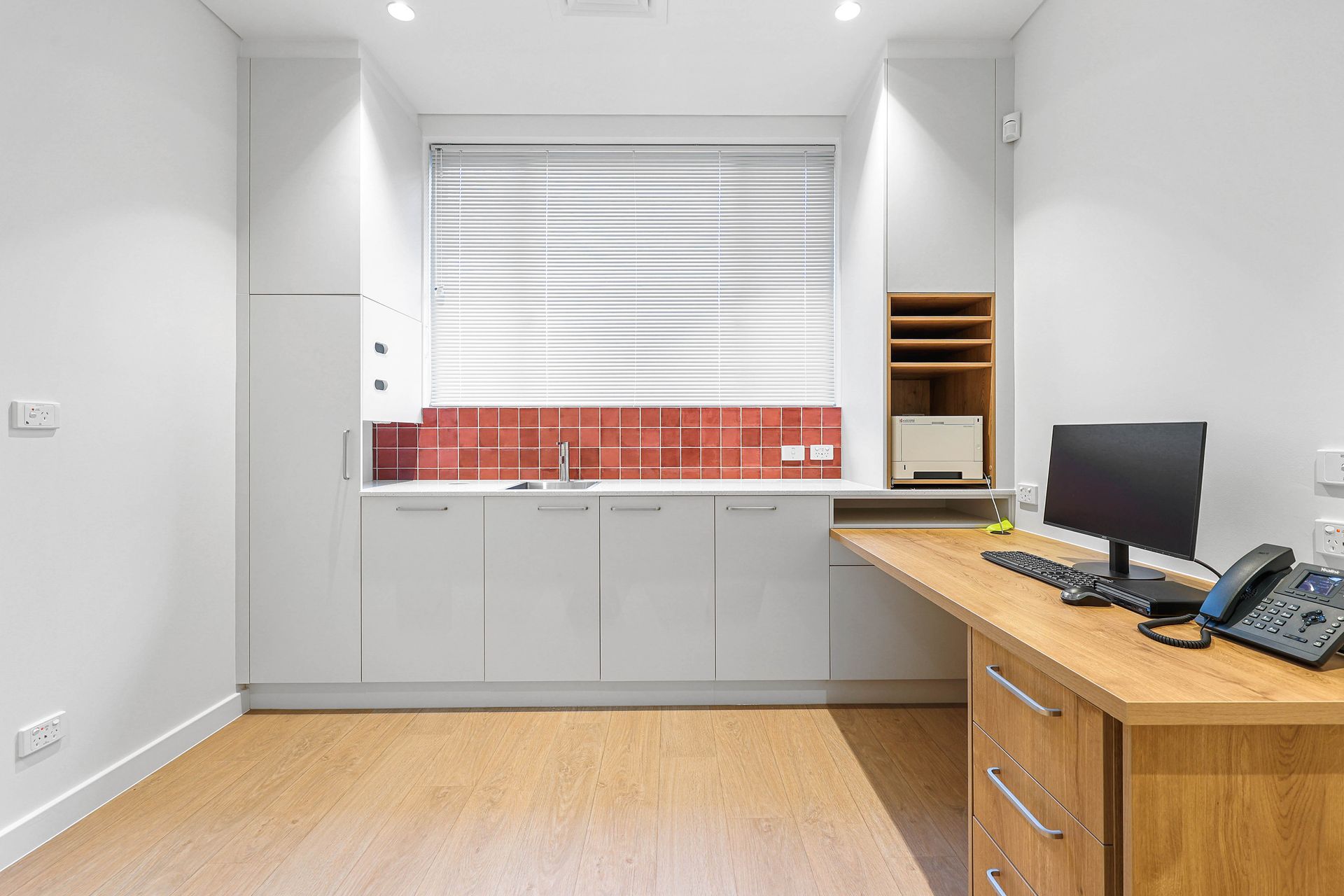 Bright Office With a Wooden Desk, Gray Cabinets — Above & Beyond Interiors in Smeaton Grange, NSW