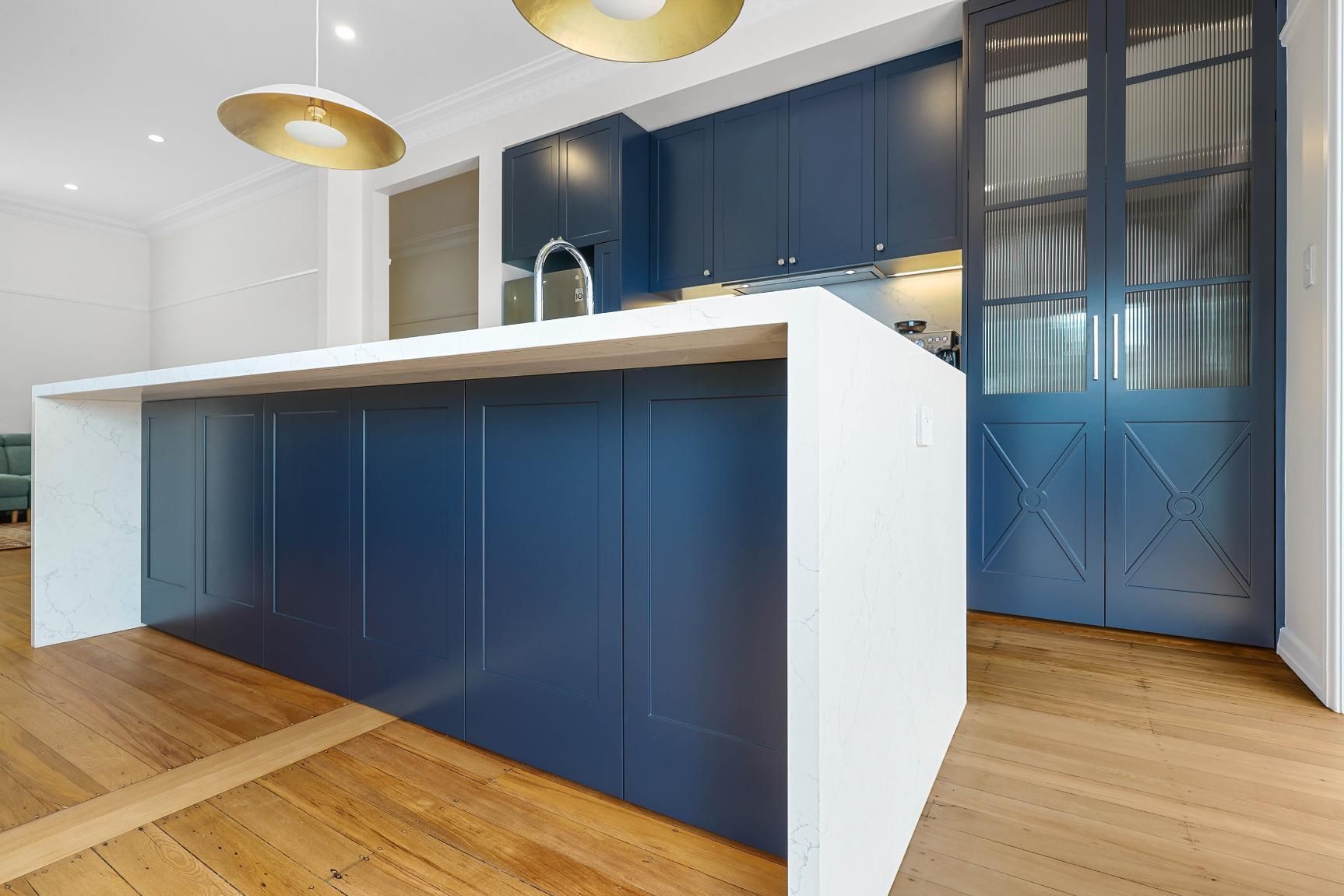 Modern Kitchen With Navy Cabinets, White Island — Above & Beyond Interiors in Smeaton Grange, NSW