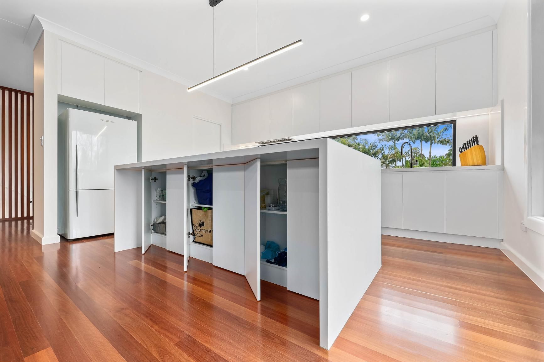 Bright Modern Kitchen with White Cabinets — Above & Beyond Interiors in Smeaton Grange, NSW