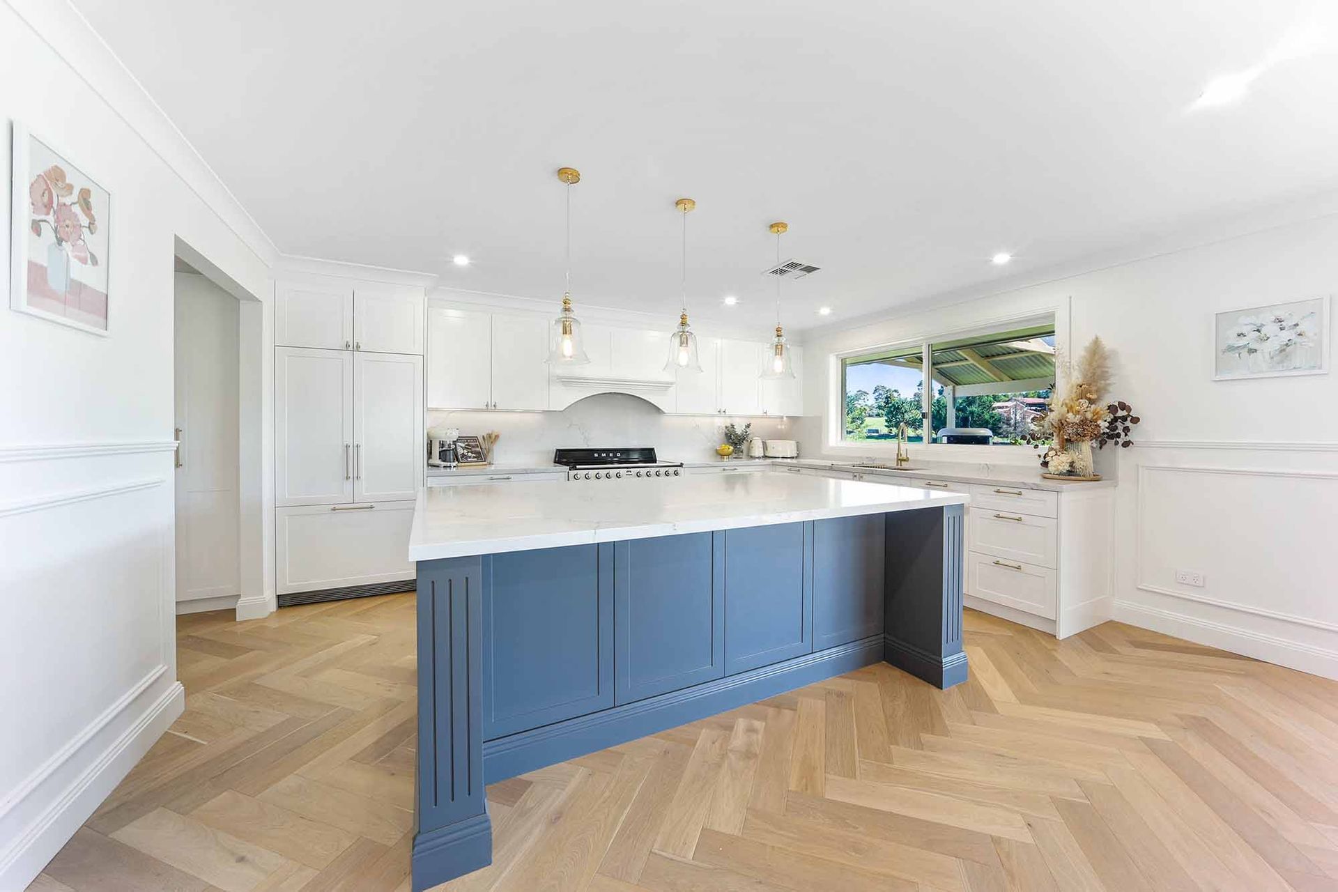 Bright Modern Kitchen With Blue Island — Above & Beyond Interiors in Smeaton Grange, NSW