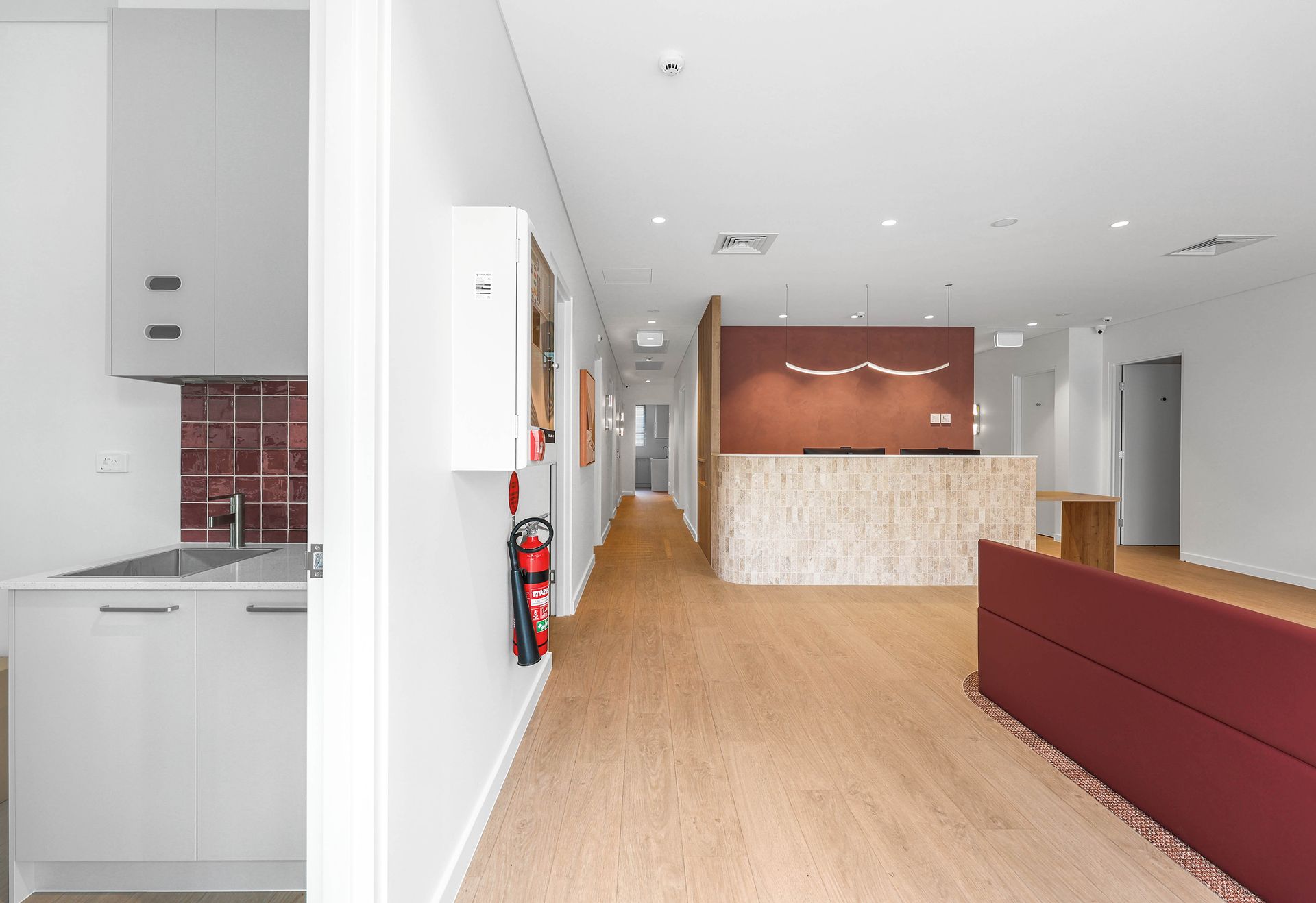Modern Office Lobby With Light Wood Floors — Above & Beyond Interiors in Smeaton Grange, NSW