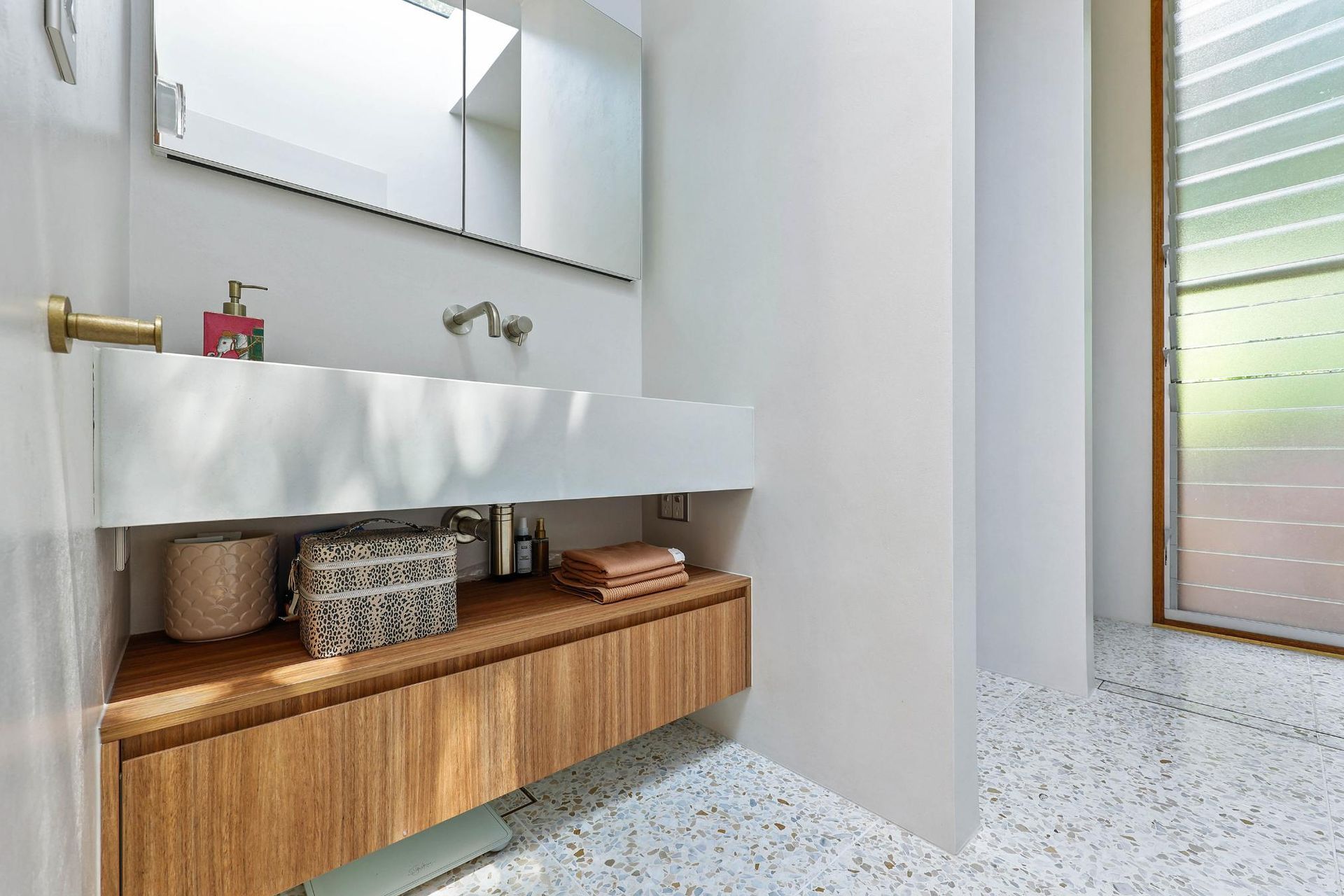 Modern Bathroom Vanity With Mirror, White Sink, Wood Storage Shelf — Above & Beyond Interiors in Smeaton Grange, NSW
