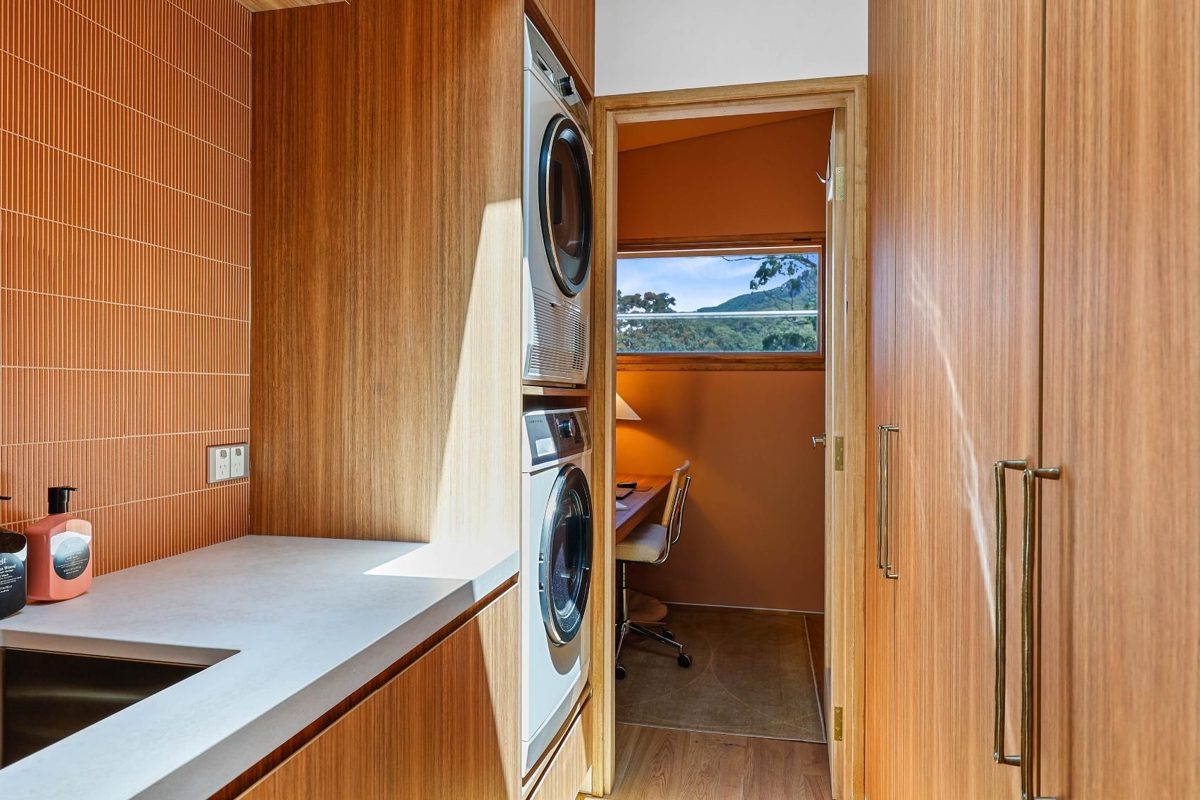 Narrow Wooden Camper Interior With Kitchenette — Above & Beyond Interiors in Smeaton Grange, NSW