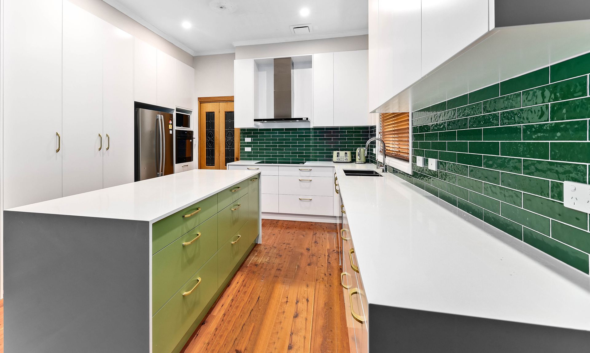 Bright Modern Kitchen with White Cabinets — Above & Beyond Interiors in Smeaton Grange, NSW