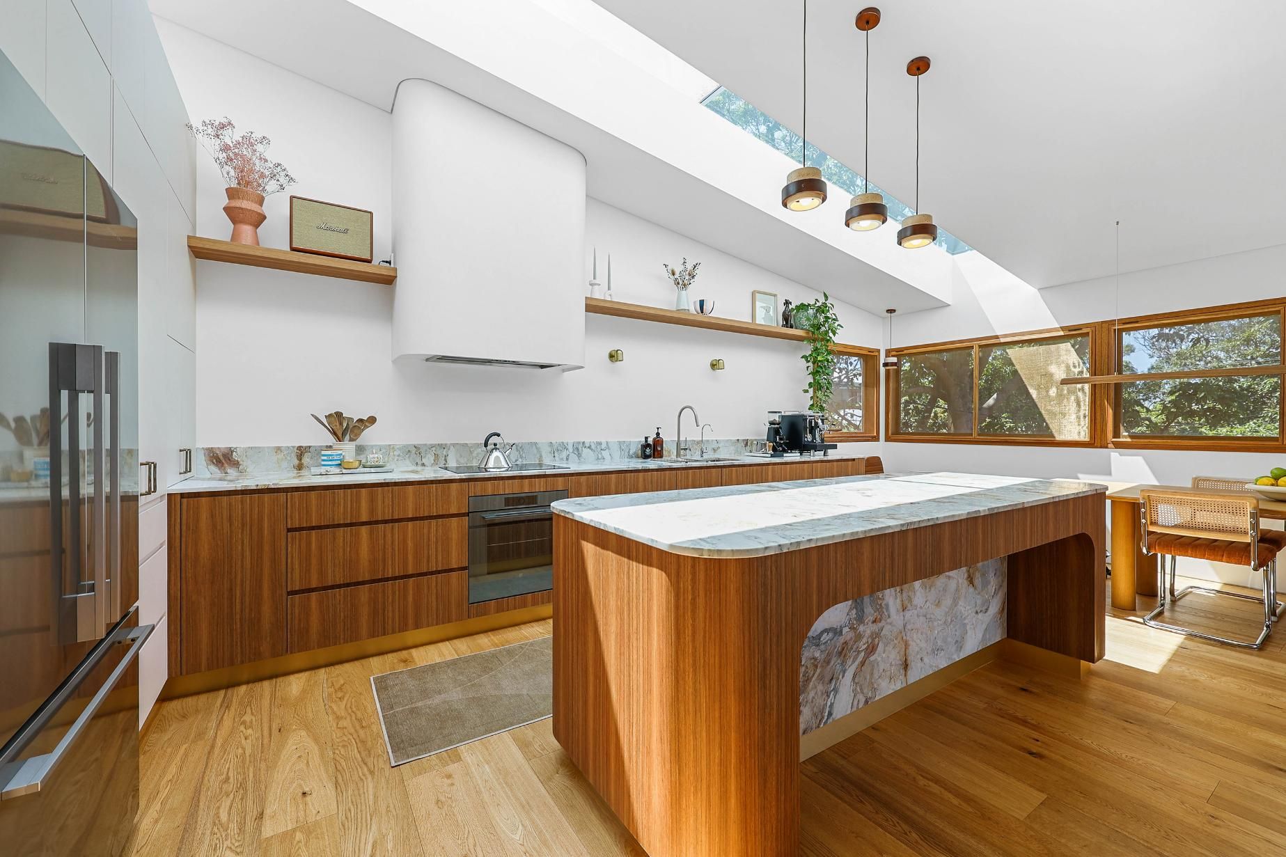 Modern Kitchen With Wood Island, White Cabinetry — Above & Beyond Interiors in Smeaton Grange, NSW