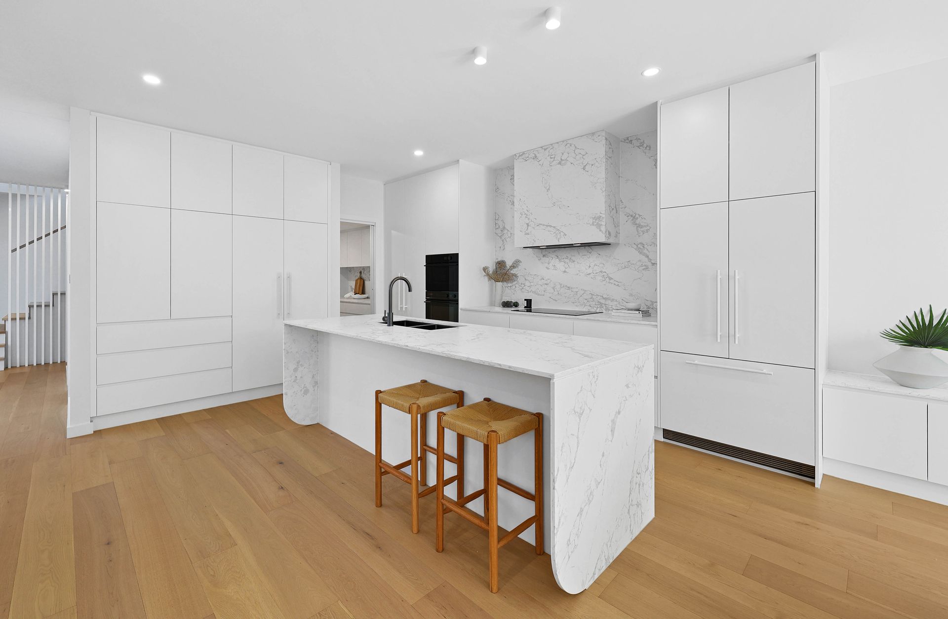 Bright Modern White Kitchen With Marble Island — Above & Beyond Interiors in Smeaton Grange, NSW