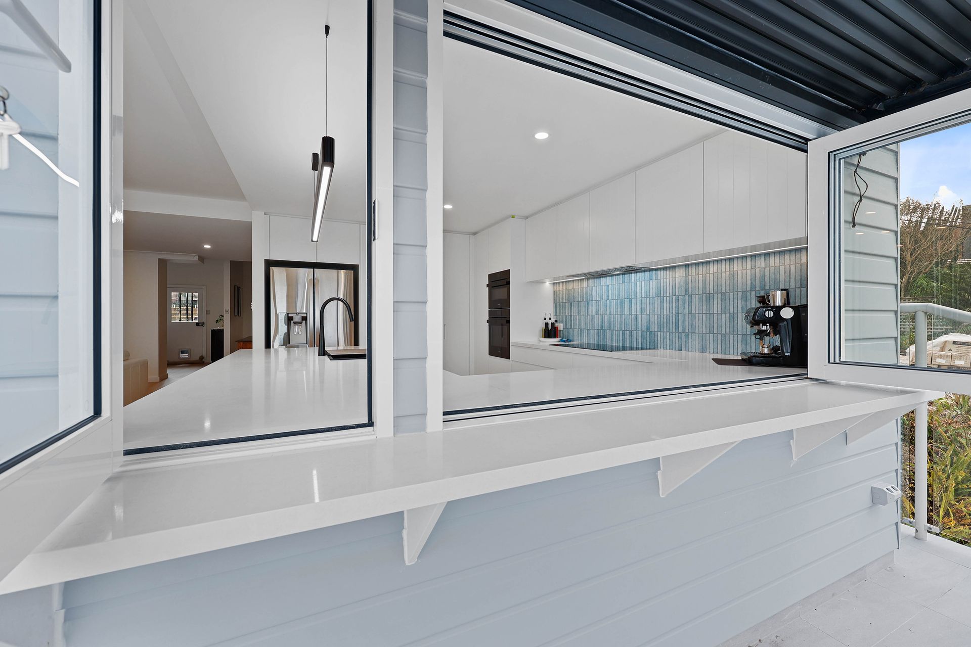 Modern White Balcony Opening to A Bright Interior — Above & Beyond Interiors in Smeaton Grange, NSW