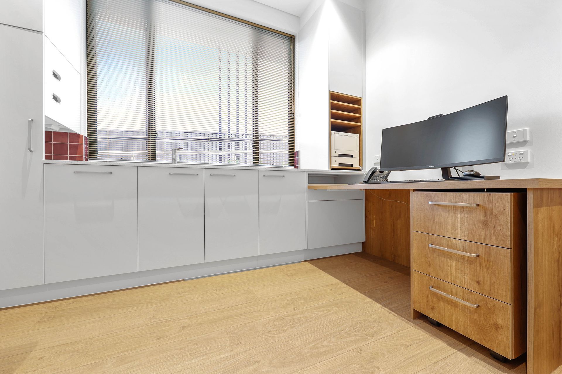 Bright Home Office With White Cabinets — Above & Beyond Interiors in Smeaton Grange, NSW