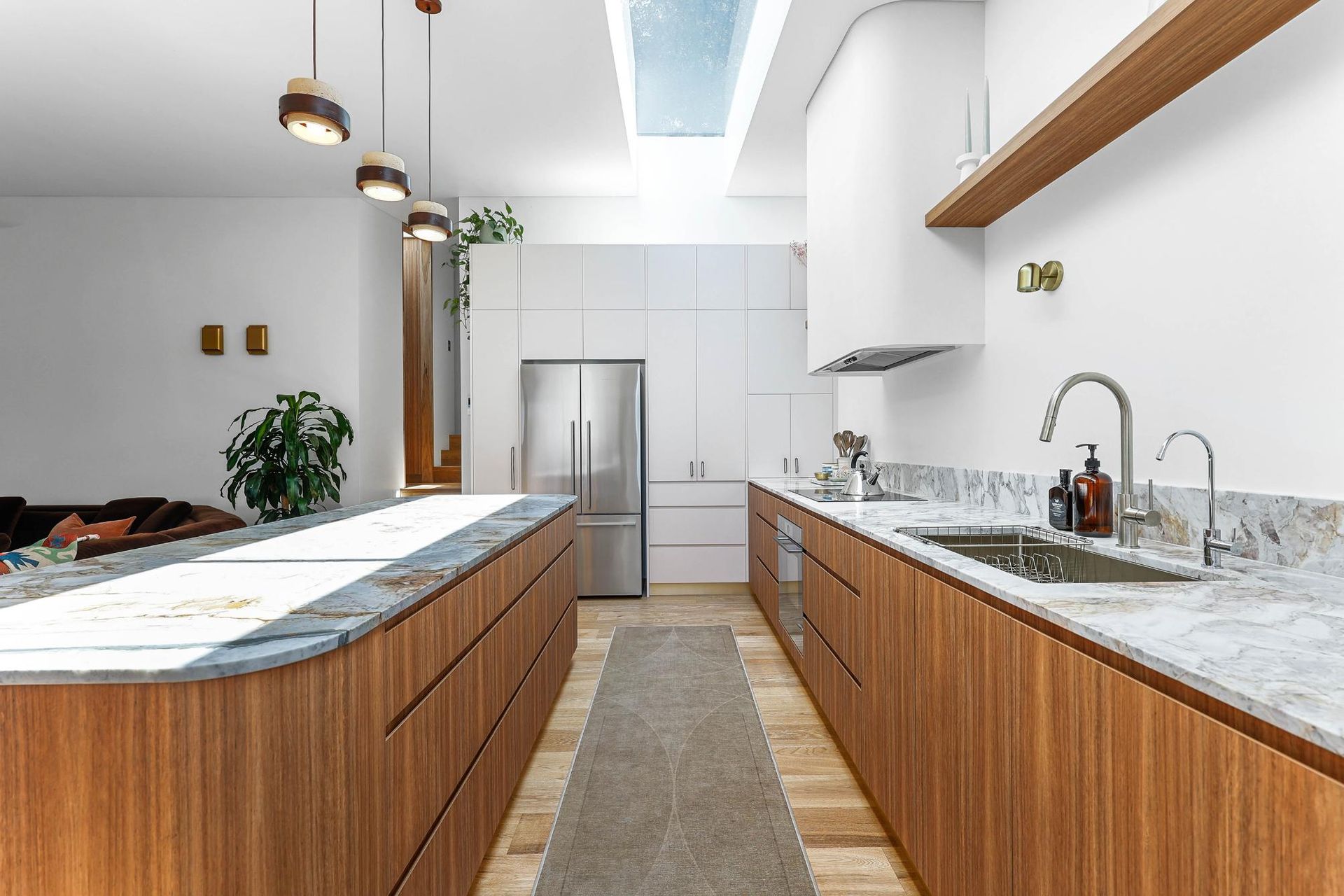 Modern Kitchen With Wood Cabinets, Marble Countertops — Above & Beyond Interiors in Smeaton Grange, NSW