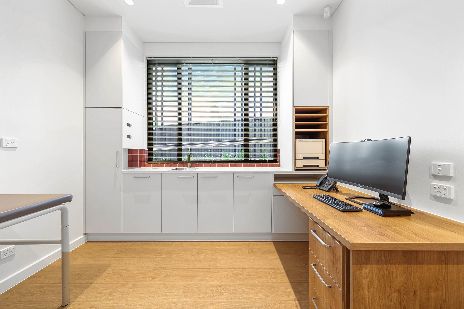 Modern Office With Wooden Desk, Computer Monitor — Above & Beyond Interiors in Smeaton Grange, NSW