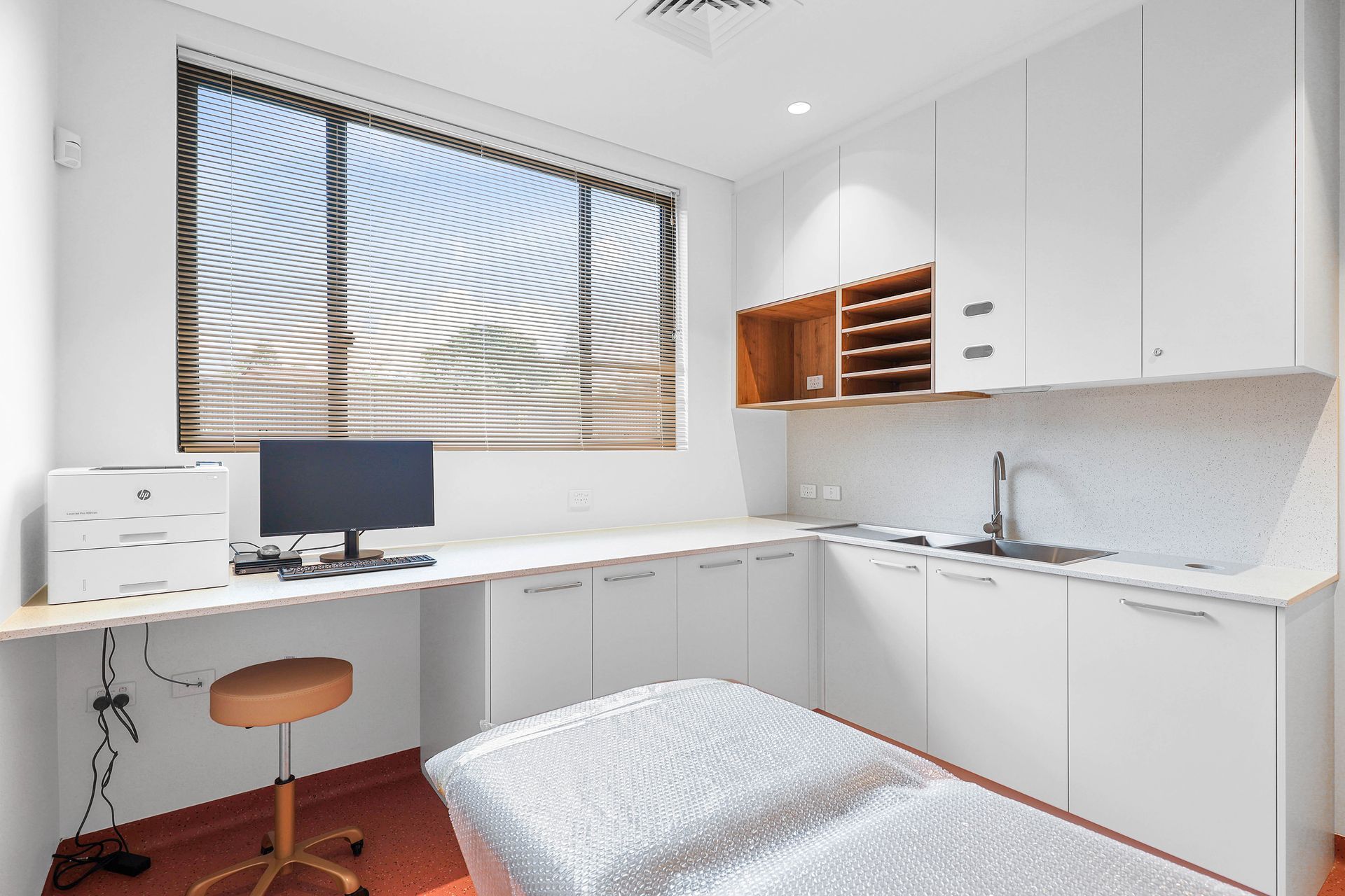 Bright White Home Office With Desk, Computer — Above & Beyond Interiors in Smeaton Grange, NSW