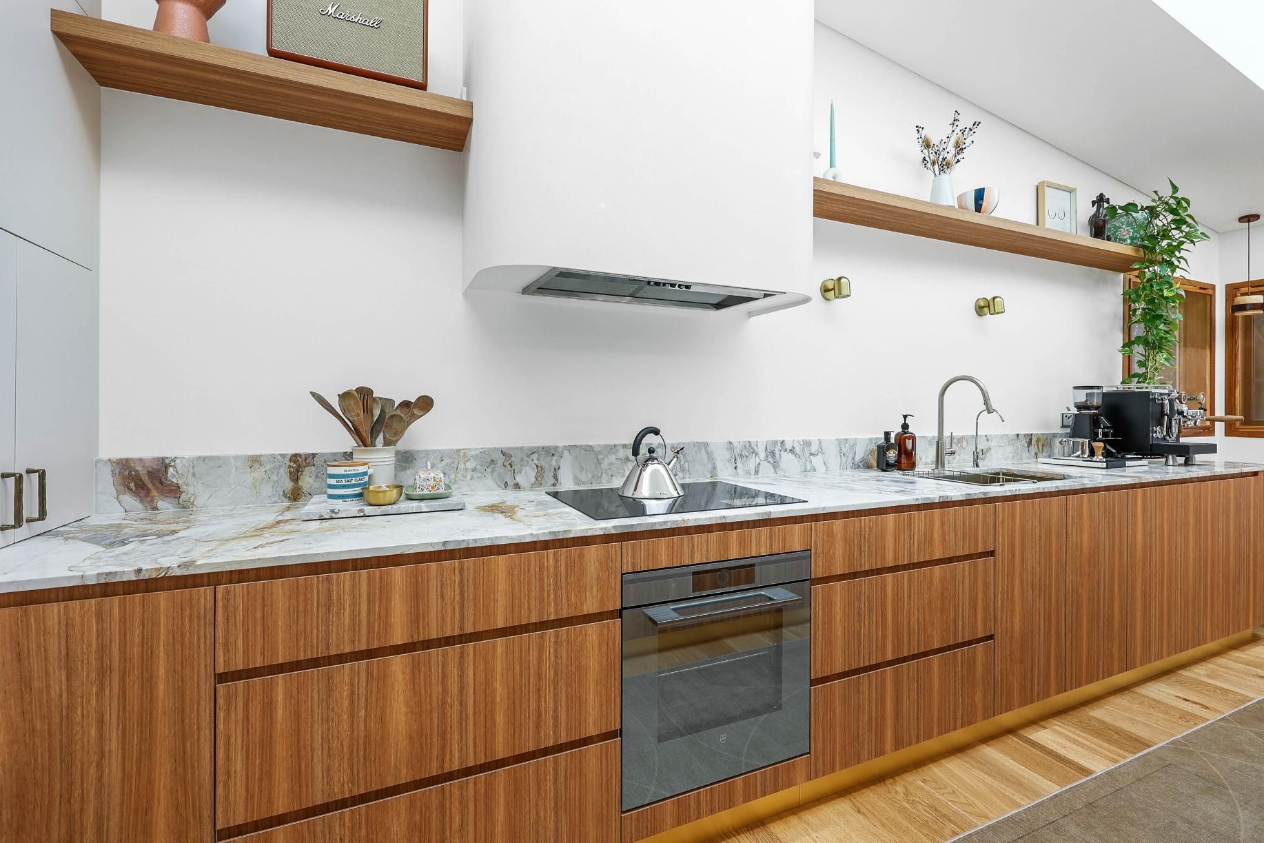 Modern Kitchen With Wood Cabinets, Marble Counters — Above & Beyond Interiors in Smeaton Grange, NSW