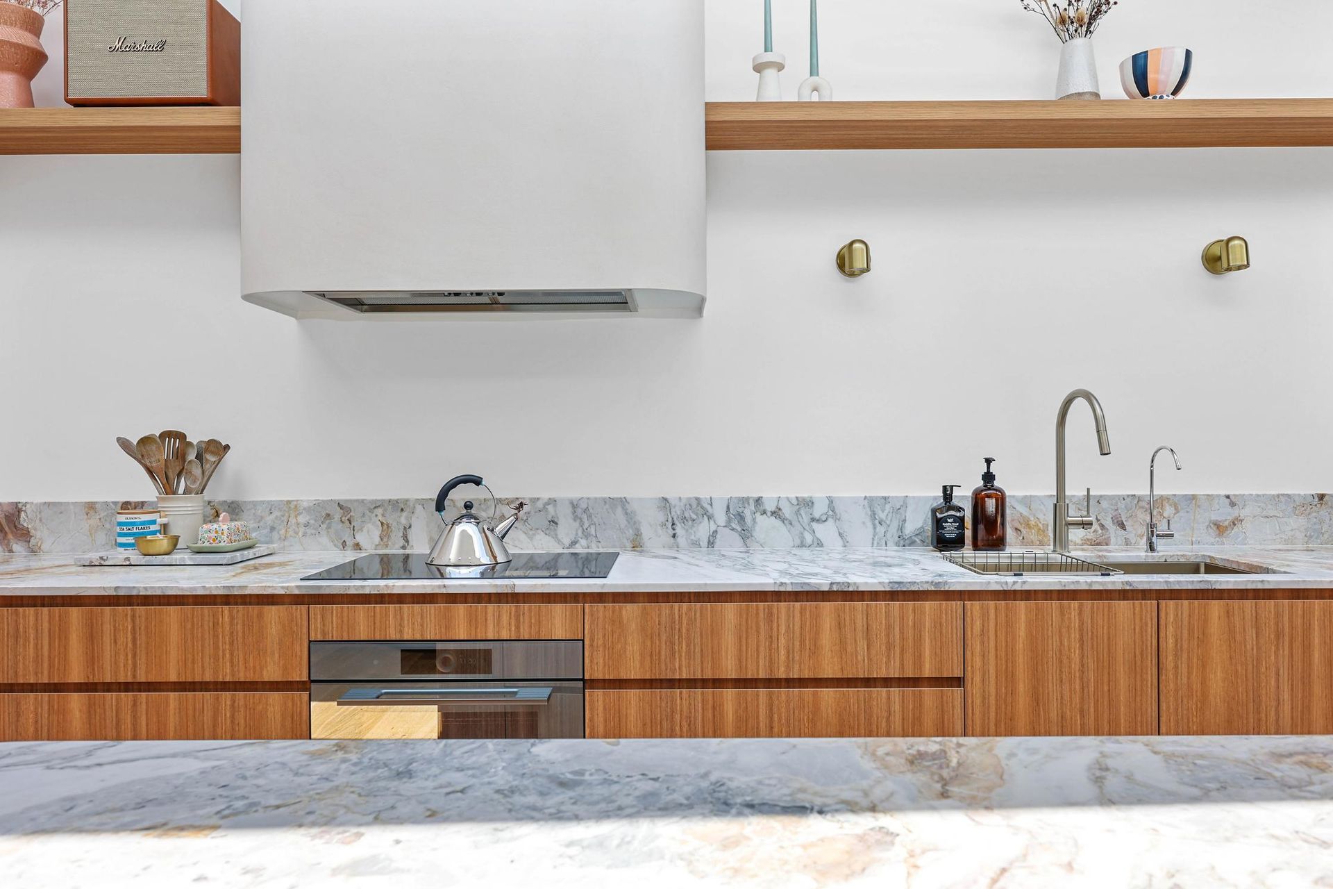 Modern Kitchen With Wooden Cabinets — Above & Beyond Interiors in Smeaton Grange, NSW