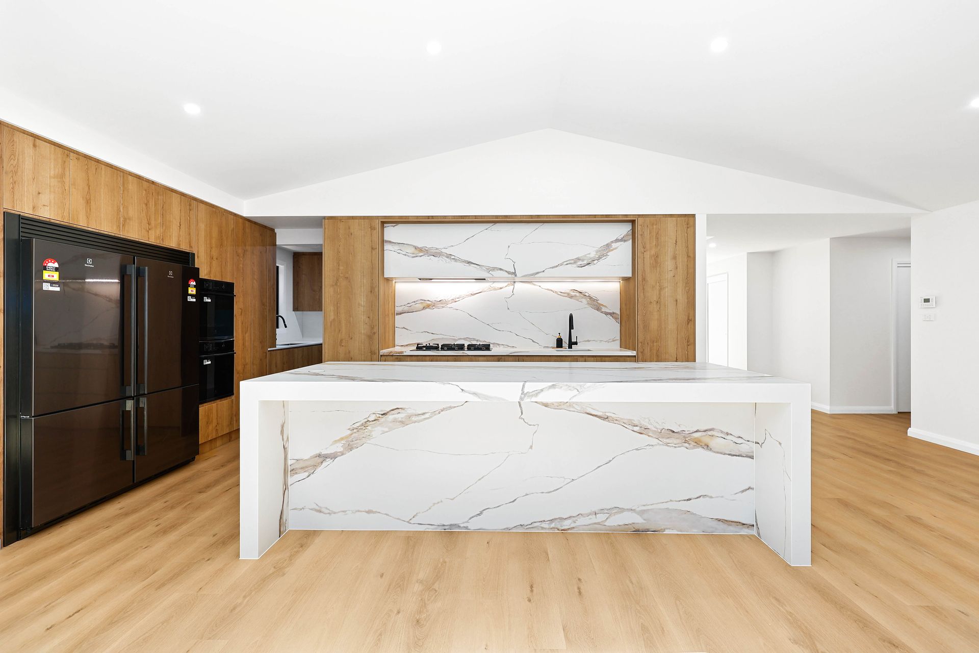 Modern Kitchen with White Marble Island — Above & Beyond Interiors in Smeaton Grange, NSW