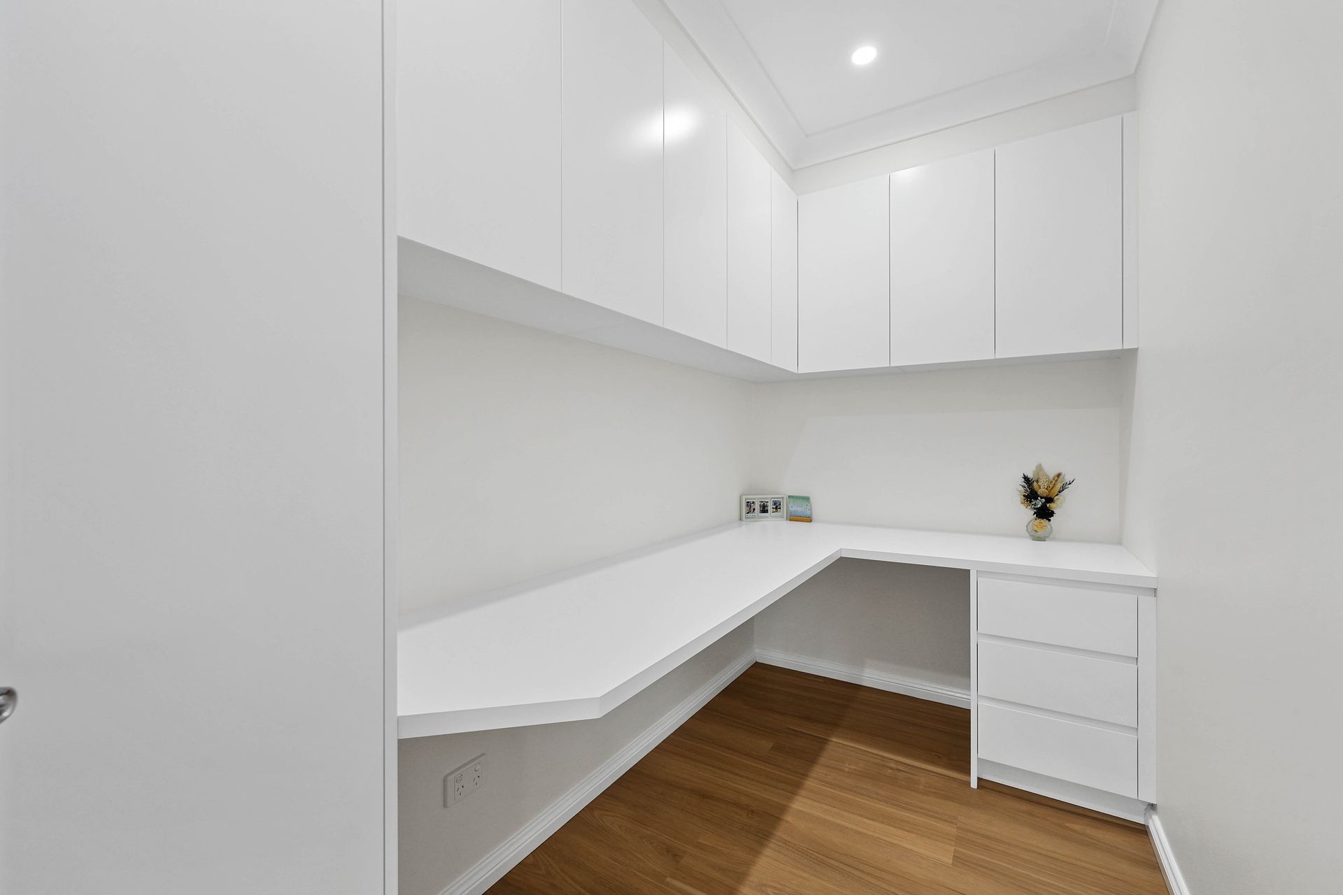 White Built-In Home Office with Shaped Desk — Above & Beyond Interiors in Smeaton Grange, NSW